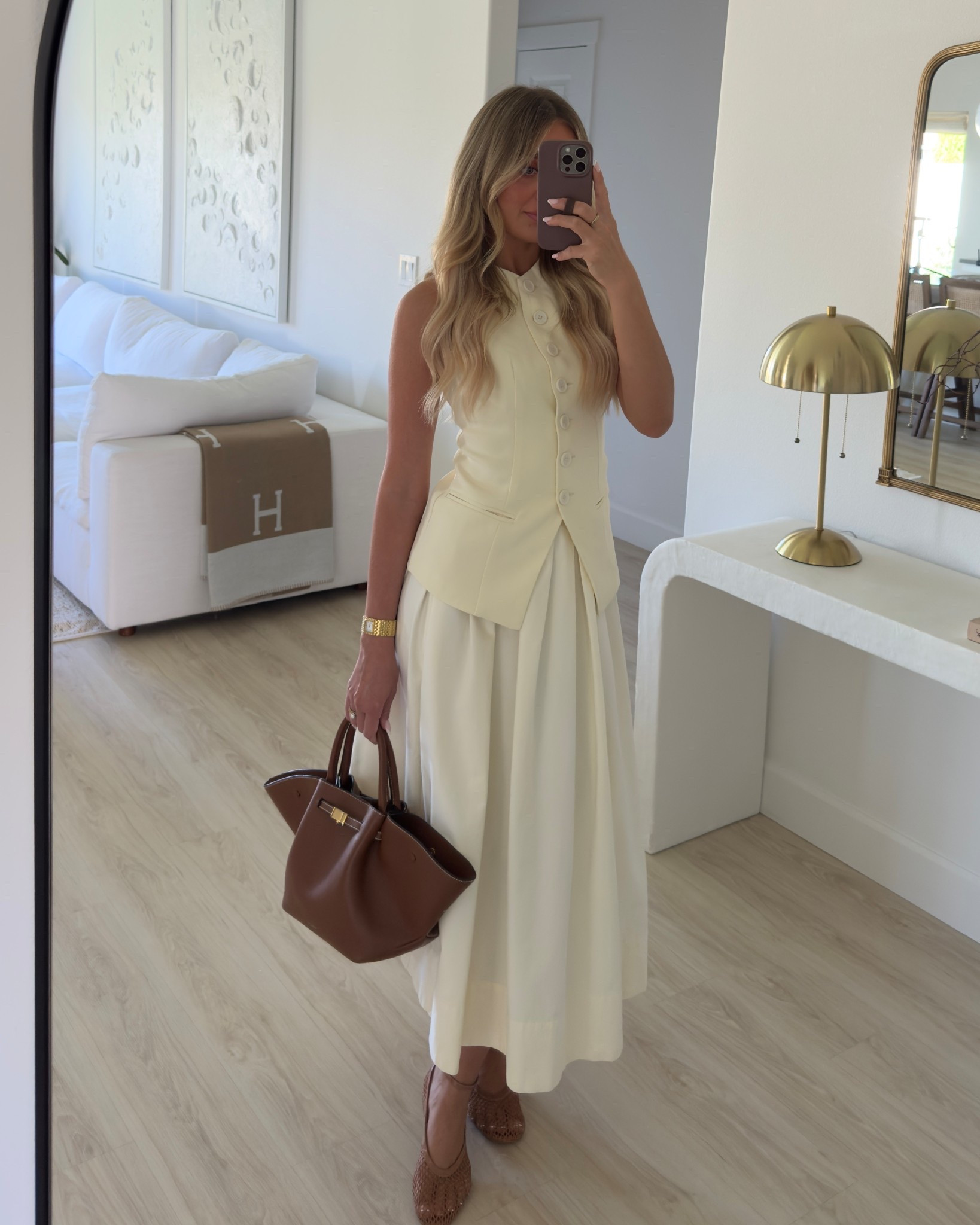 Sunday church fit. Cream midi skirt, button vest, mesh flats, demellier new york midi gold bag 

#LTKSeasonal #LTKU #LTKWorkwear