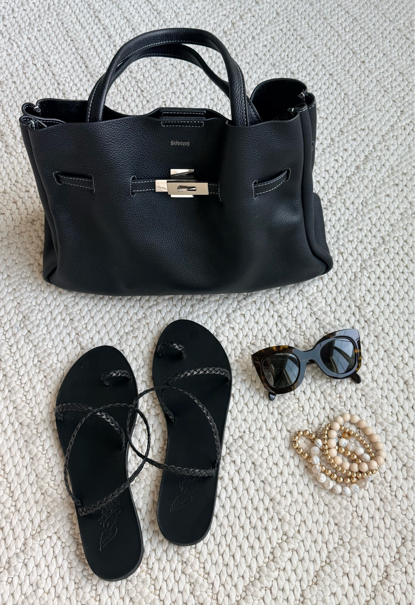 Timeless accessories you’ll wear on repeat. 🖤 The perfect black tote, braided leather sandals, chic sunglasses, and stackable bracelets are the effortless staples that elevate every outfit.

#LTKdayinmylife #LTKgrwm #LTKootd