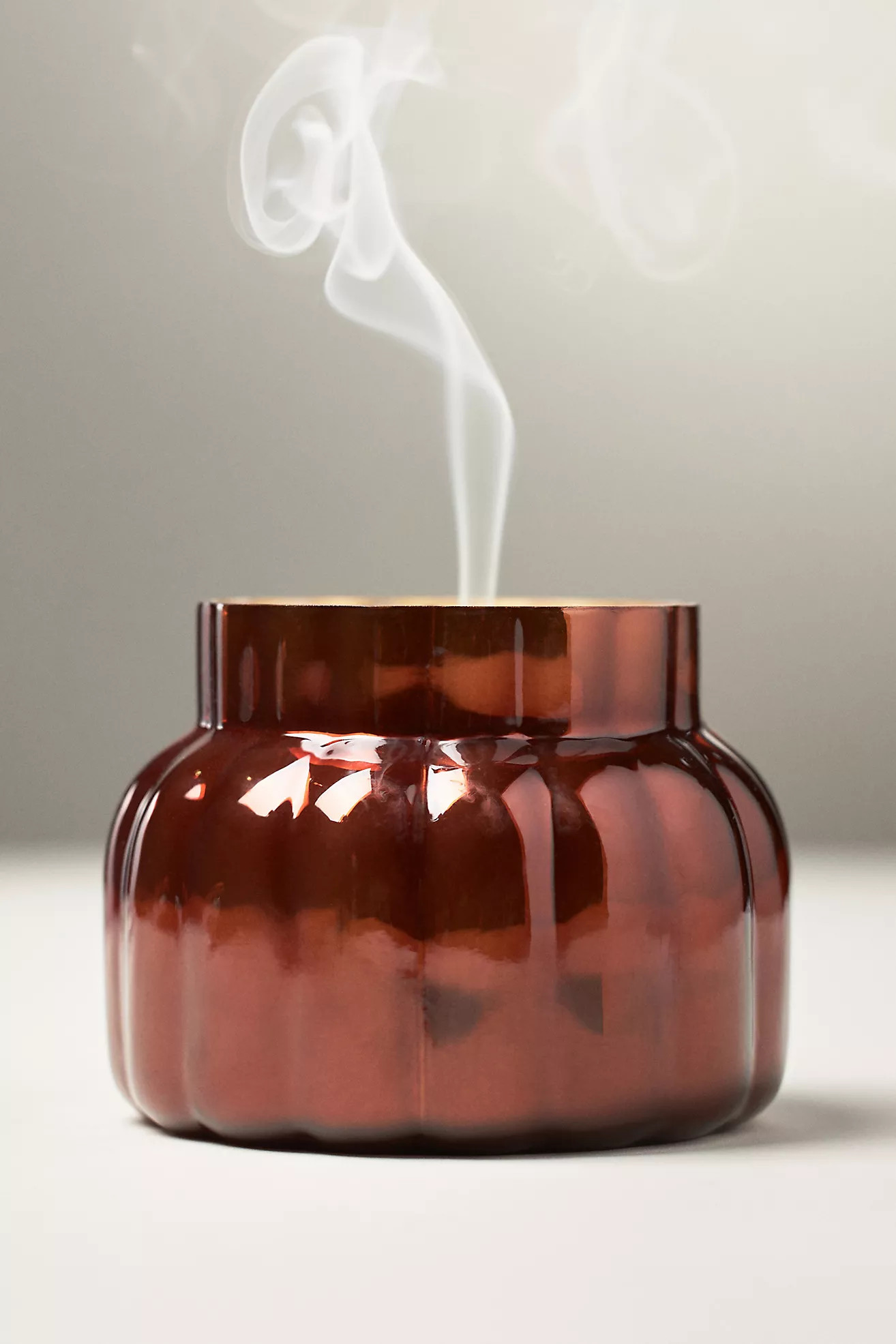 Capri Blue Pumpkin Clove Brown Ribbed Glass Candle | Anthropologie (US)