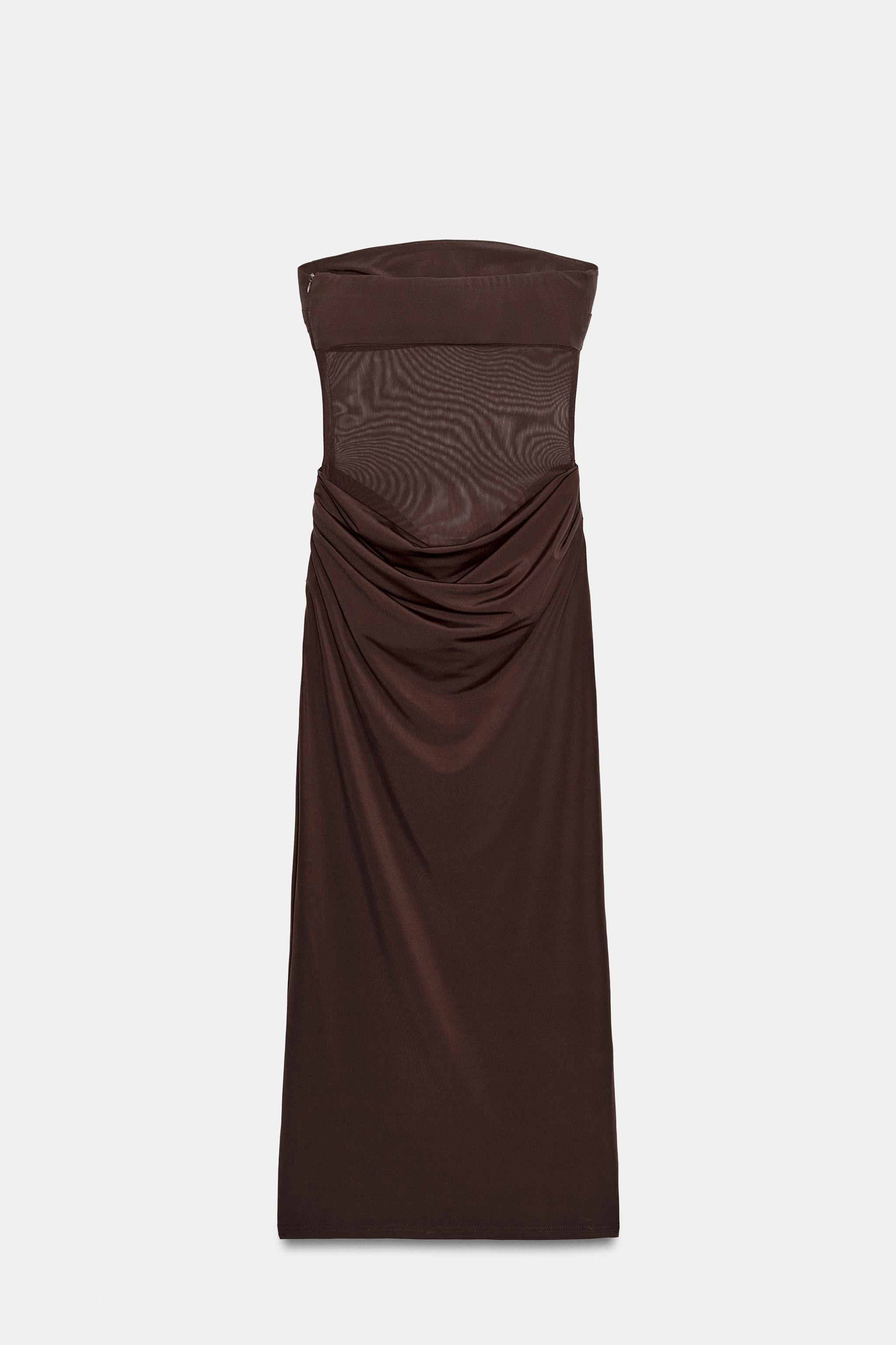 Model height: 180 cmStrapless dress with a straight neckline. Featuring semi-sheer fabric with ma... | Zara UK