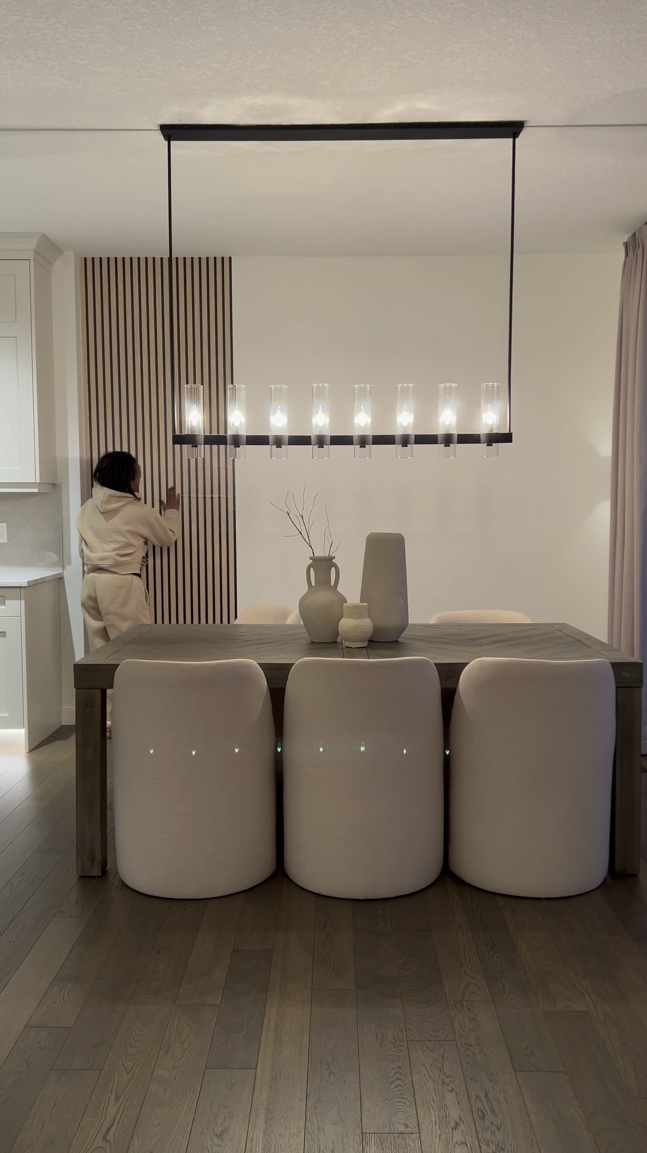 (I used color Wood A)

 Hey friend! ☺️

So here’s a simple way to upgrade your wall and get the wooden slat look with wallpaper! 🎉

Tips: 
Wallpaper is peel and stick so to remove, use a blow dryer so you don’t mess up your paint or drywall ☺️ I used 3 rolls. My wall is 9ft by 10.5ft 

This is by far the simplest wallpaper I’ve installed. The design is forgiving, so even if you overlap a bit more than you’d like, it isn’t noticeable… making install even simpler. 

I added plug in 16 ft LED light strips to the back of the mirror. Color is warm white or 3000K. 🔌 My mirror is 83inches in height by 48 inches. 🪞 

The sconces are my favorite addition to this wall! They are rechargeable. 🎉 They attach to the wall in two ways - They come with screws & a peel and stick adhesive….. which attaches to a magnetic metal piece which makes the sconce removable without having to reinstall it. 💕

I’ve linked the rest of the items below! ☺️

#LTKhome #LTKstyletip #LTKVideo

#LTKStyleTip #LTKHome