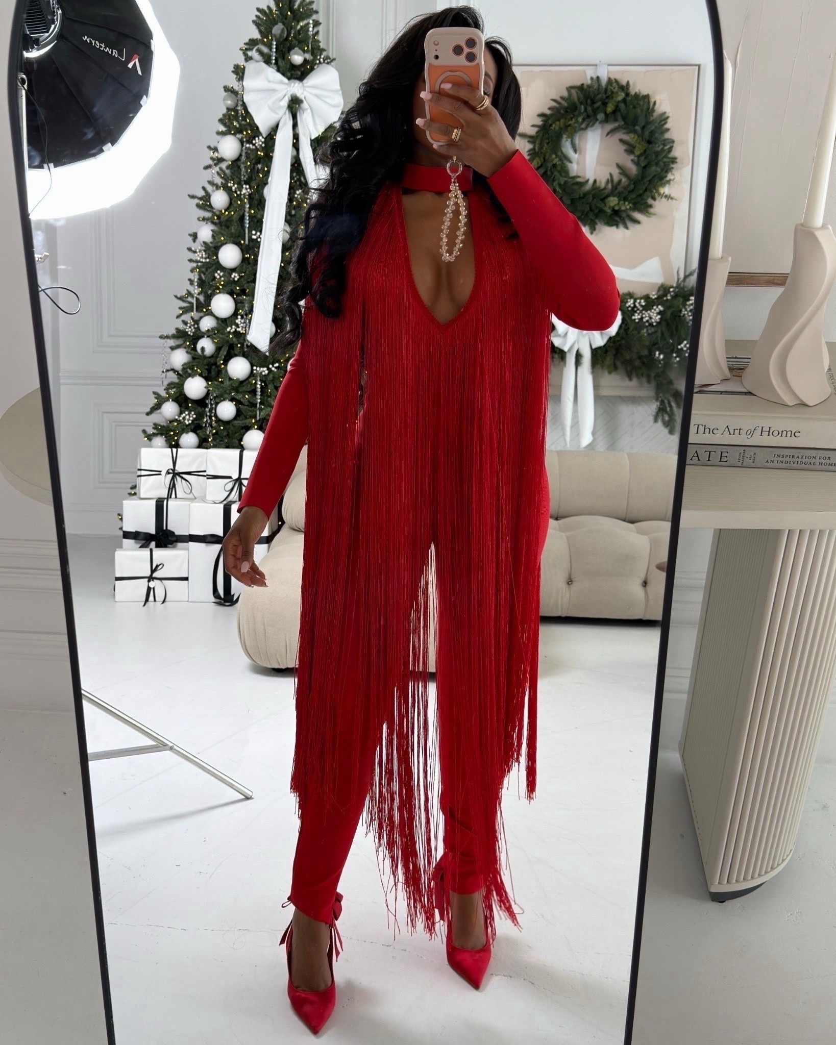 A bold holiday glam moment in this red fringe jumpsuit — confident, eye-catching, and made to turn heads. The red satin heels complete the monochrome look for a festive finish.

Perfect for holiday parties, New Year’s Eve, or a glamorous night out.

📏 Sizing: Small
Height — 5’4” | 138 lbs | Bust — 34D | Waist — 27” | Hips — 40” | Jeans/Pants — 27 Long or 4 Long

Save this post

A striking red holiday jumpsuit outfit with fringe detailing and a sleek monochrome finish for bold seasonal style.

Follow me on Instagram and YouTube @kirasfashionfinds

Everything linked for easy shopping!

#LTKootd #LTKHoliday #LTKPetite