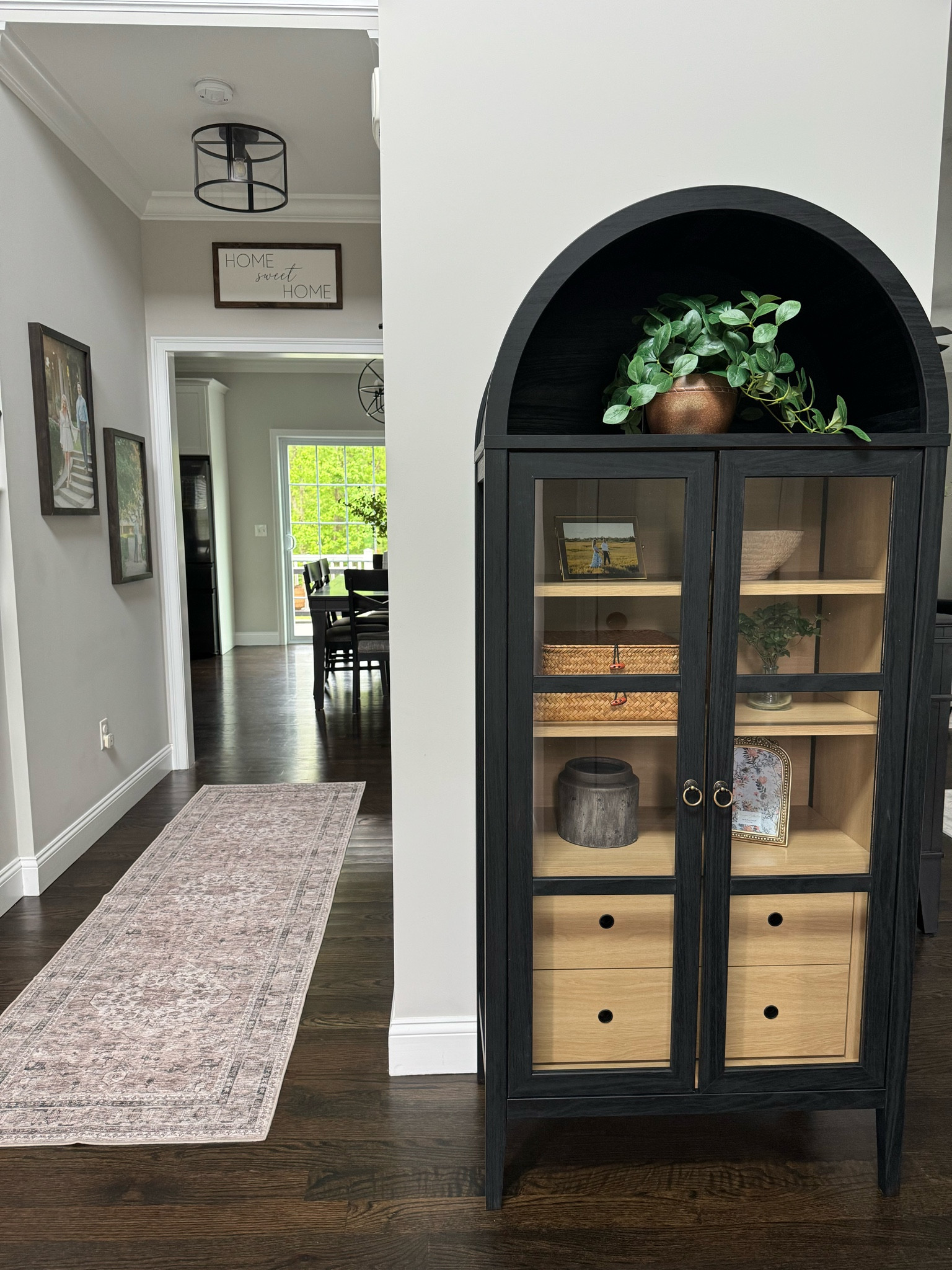 Modern organic entryway styling on a budget! 

‼️ the black arch cabinet is on sale for under $500!

#LTKSaleAlert #LTKHome #LTKStyleTip