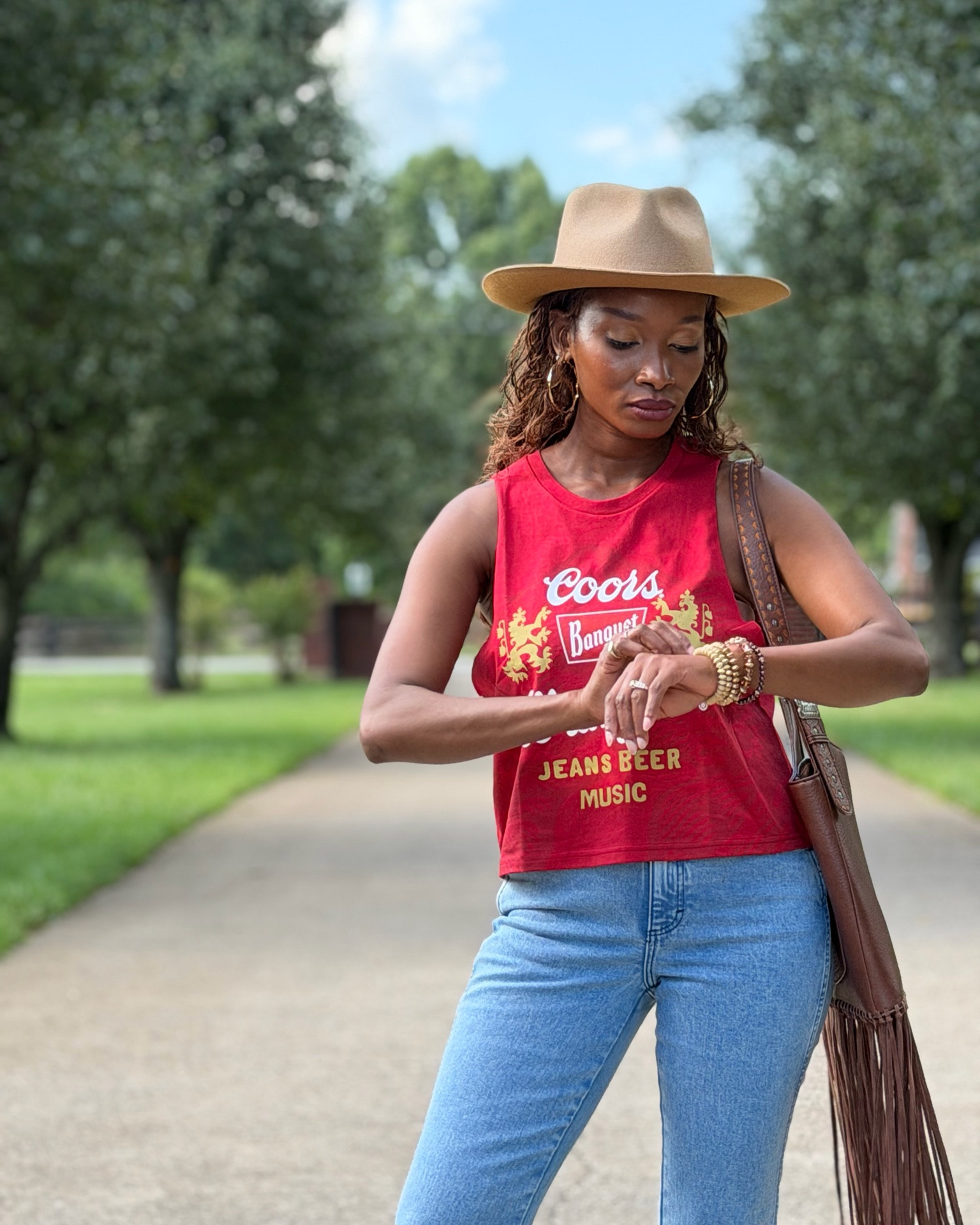 The cutest tank top to wear for country concert, rodeo shows, tail gating with friends and family. 

True fit and am wearing size medium. @Wrangler 

Grab your size and slay in western style!

#LTKgrwm #LTKootd #LTKPetite