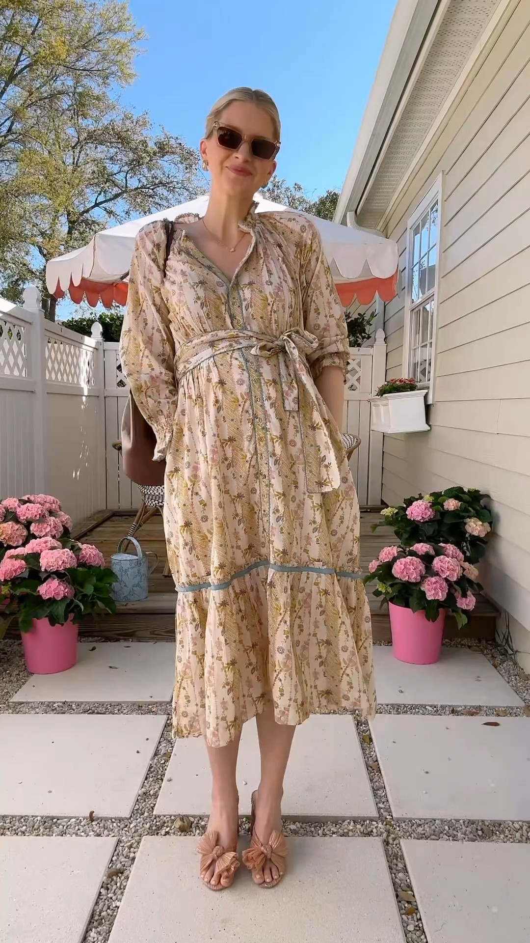 Yellow blue and pink floral, midi dress, functioning buttons perfect for a baby bump and post baby! I’m wearing a size small, run true to size so beautifully made. Would be a perfect Easter Sunday dress! There are matching little girl and baby dresses as well. 

#LTKkids #LTKbaby #LTKbump