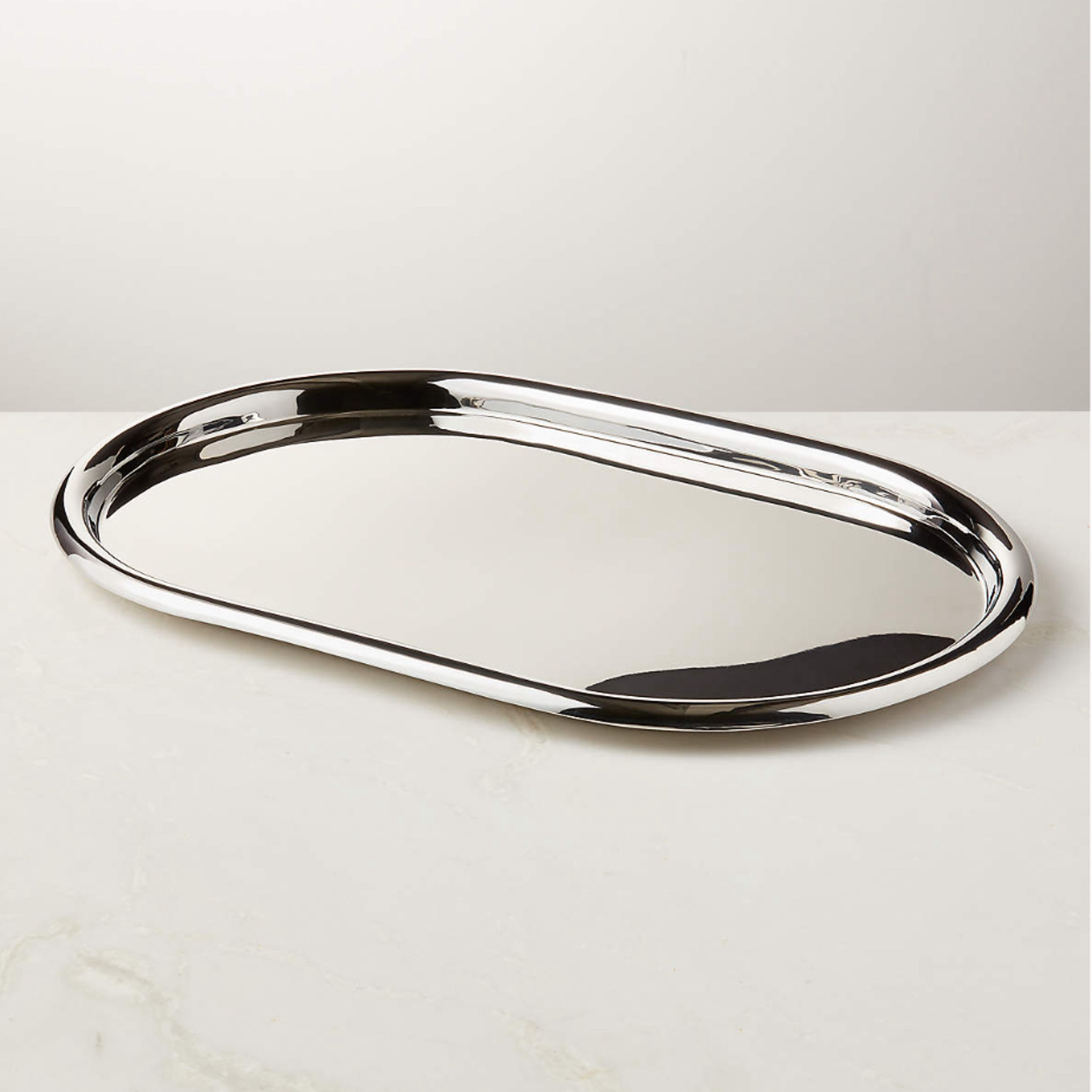 Serve your cocktails in style with the Piero Oval Polished Stainless Steel Tray by Gianfranco Frattini! Sleek and sophisticated, it’s a stunning addition to any home bar.

#LTKGiftGuide #LTKHoliday #LTKSeasonal