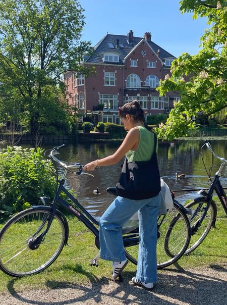 bike ride through Amsterdam 🚲

wearing xxs in top & 24 in jeans 

#LTKtravel #LTKfindsunder100 #LTKSeasonal
