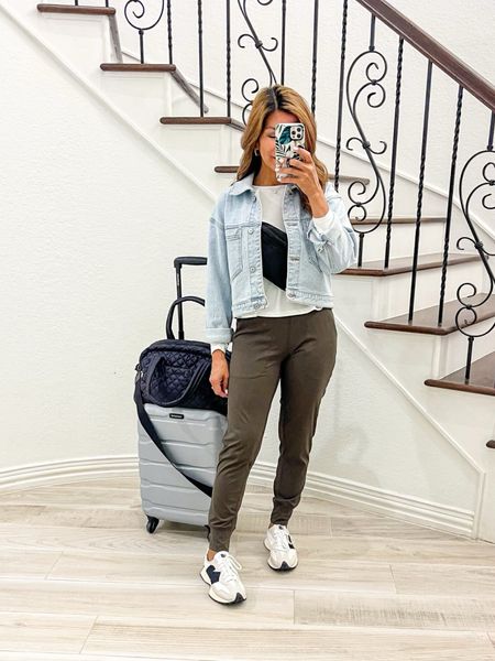 Airport outfit, Travel outfit.
Long sleeve top in small tts, white.
Active Pants in XS, color Olive Green, tons of colors, stretchy and comfy.
White sneakers fit tts.
Tank top underneath that you can layer I size up to 6.
Denim jacket exact one sold out but linking very similar one from Amazon that I also have in small.
White sandals at beginning of reel fit tts.
Belt bag, personal carry-on bag, and fav luggage are linked. I’m also linking a more affordable option of the personal bag that I also own. 
Luggage color is silver and the image online looks darker but it’s a nice silver color in person. I just bought the 3-piece set. It’s the best and high quality. 
Amazon find, spring vibes, fashion over 40, petite style, comfy outfit, casual outfit.

#LTKfindsunder50 #LTKstyletip #LTKtravel