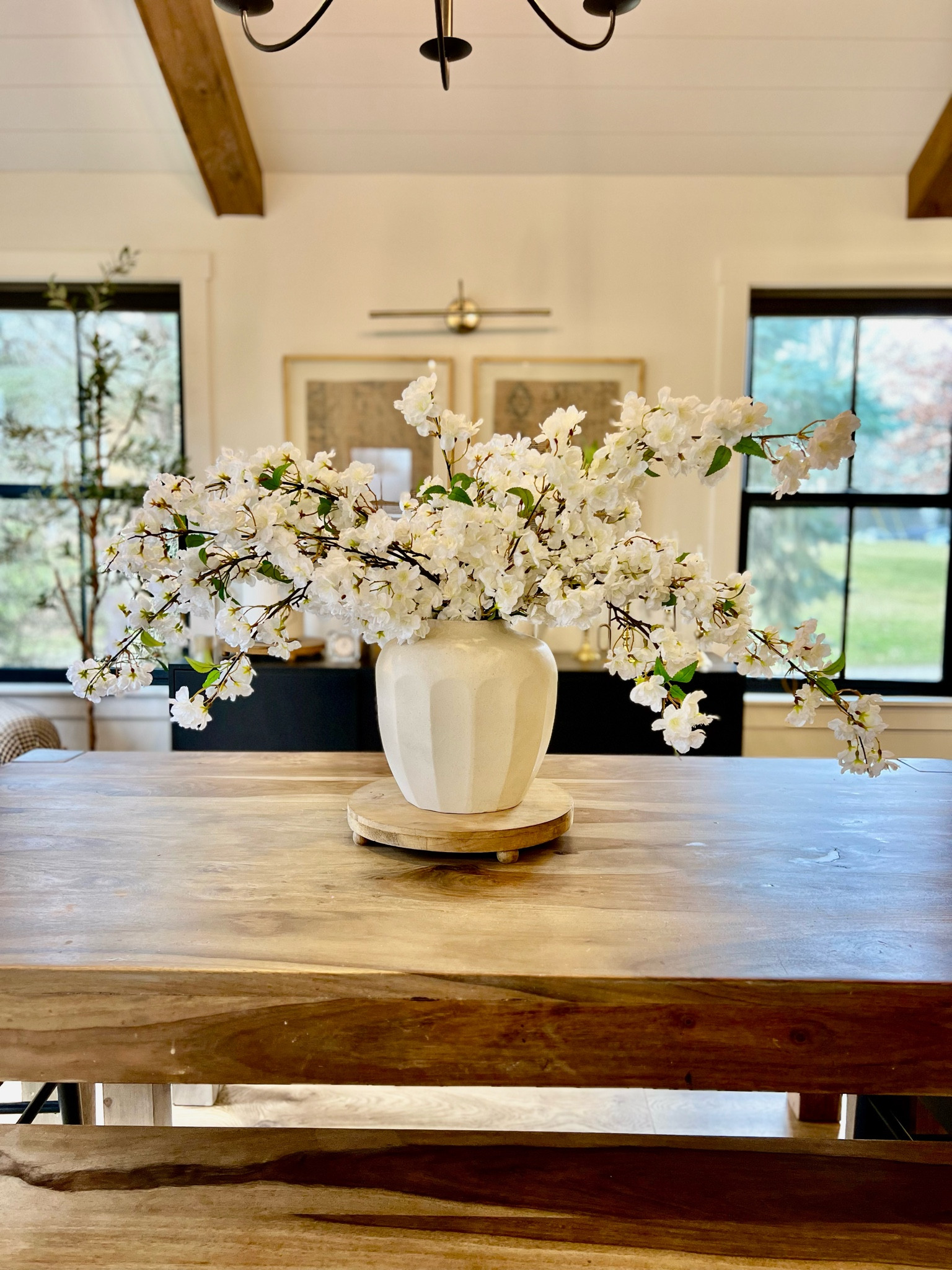 These look for less stems give a stunning springy pop to our table. I used five hobby lobby stems (search blossom spray on their website, SKU 6008387, also comes in pink) to create this look. Below, I linked the higher end version, so you can decide which cherry blossom stem you like best! Both sets are 44in in length.

#LTKSeasonal #LTKhome