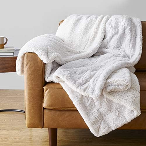 Amazon Basics Fuzzy Faux Fur Sherpa Throw Blanket, 60"x70" - Ivory | Amazon (US)
