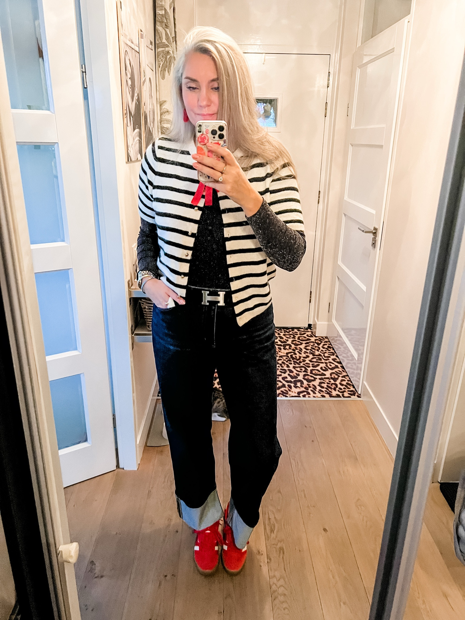 Ootd - Tuesday. Striped short sleeve cardigan over a long sleeve glitter top paired with dark blue H&M jeans and red sneakers. 

#LTKnederlands #LTKeurope #LTKwinter