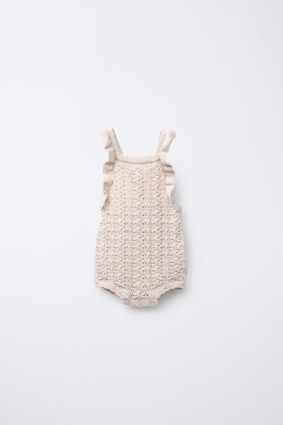 Knit romper with a straight neck and crisscross straps with button closure at back, ruffle appliq... | Zara US