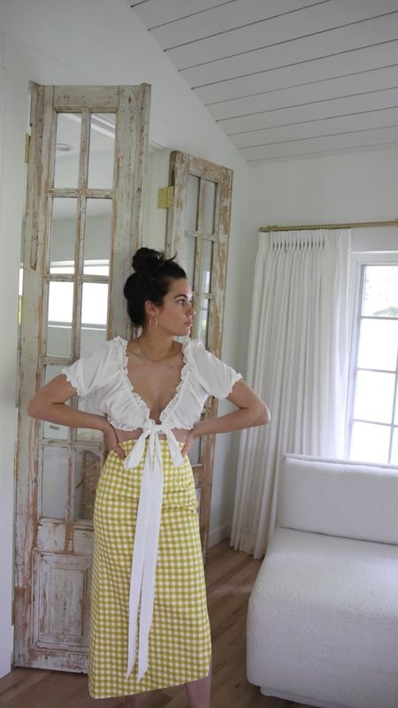 Sarah Butler of @SarahChristine wears cute yellow summer outfit. summer outfit ideas, casual summer outfits, summer outfits 2023, yellow outfit, skirt outfit, gingham print, crop top, yellow gingham

#LTKunder100 #LTKFind #LTKSeasonal