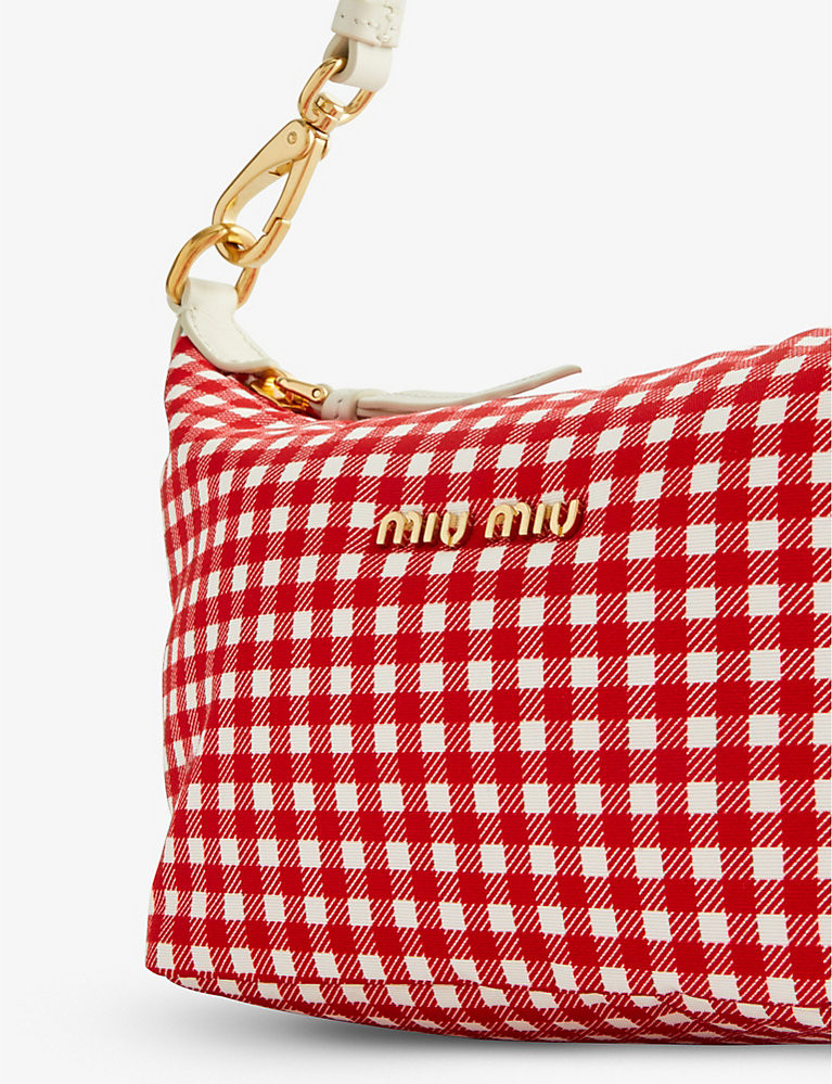 Spirit small check-print woven baguette bag | Selfridges