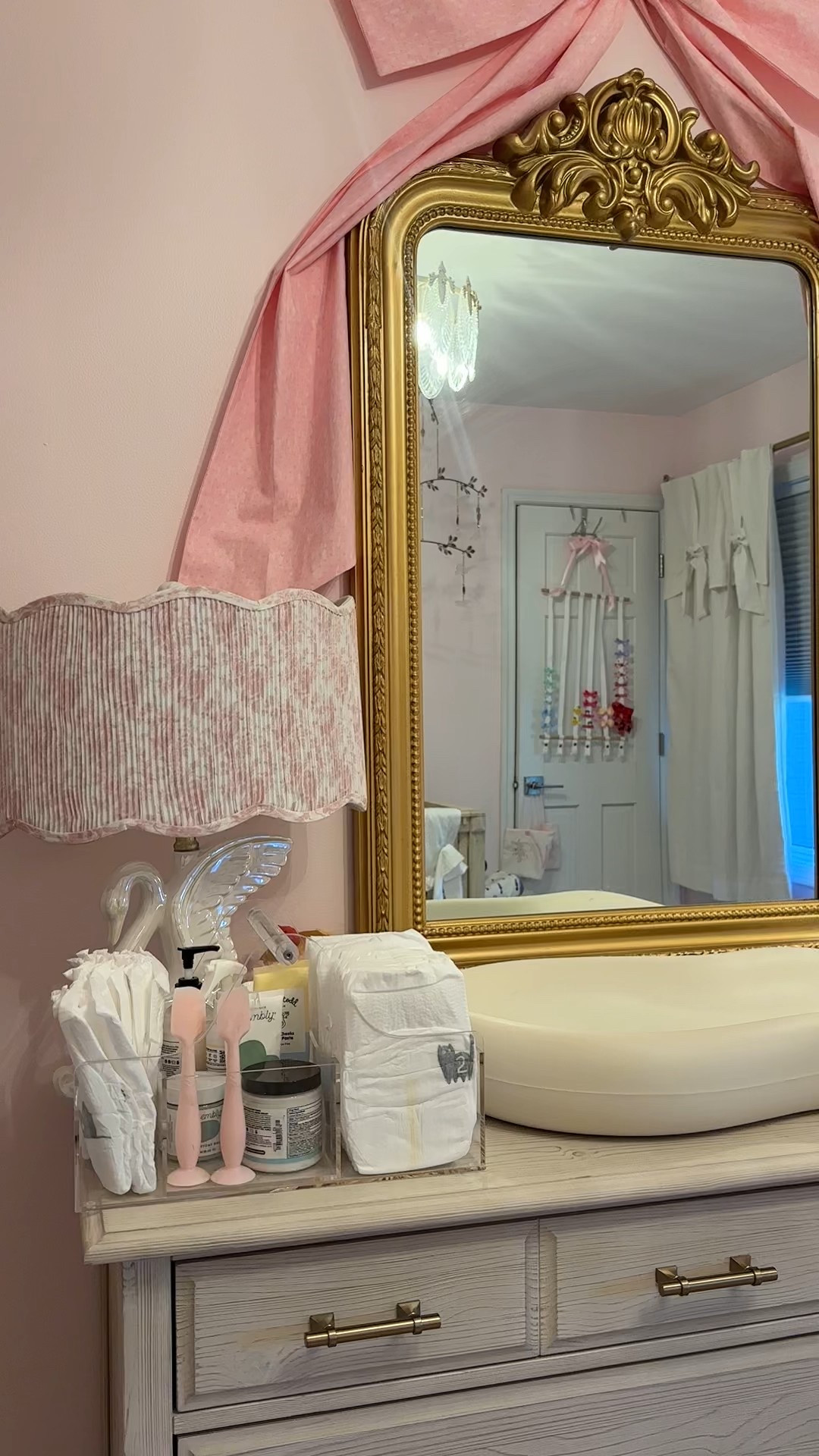 Diaper changing station details 🎀🩷 

Diaper caddy / changing pad / diaper changing pad / changing table / nursery decor / baby nursery / baby girl nursery Baby girl room / baby girl nursery / nursery decor / pink nursery decor / pink baby room / pink girls room / toddler girls room / Loveshackfancy nursery / Loveshackfancy home / pottery barn kids nursery / pottery barn baby / girly nursery / pink nursery 

#LTKBaby #LTKFindsUnder100