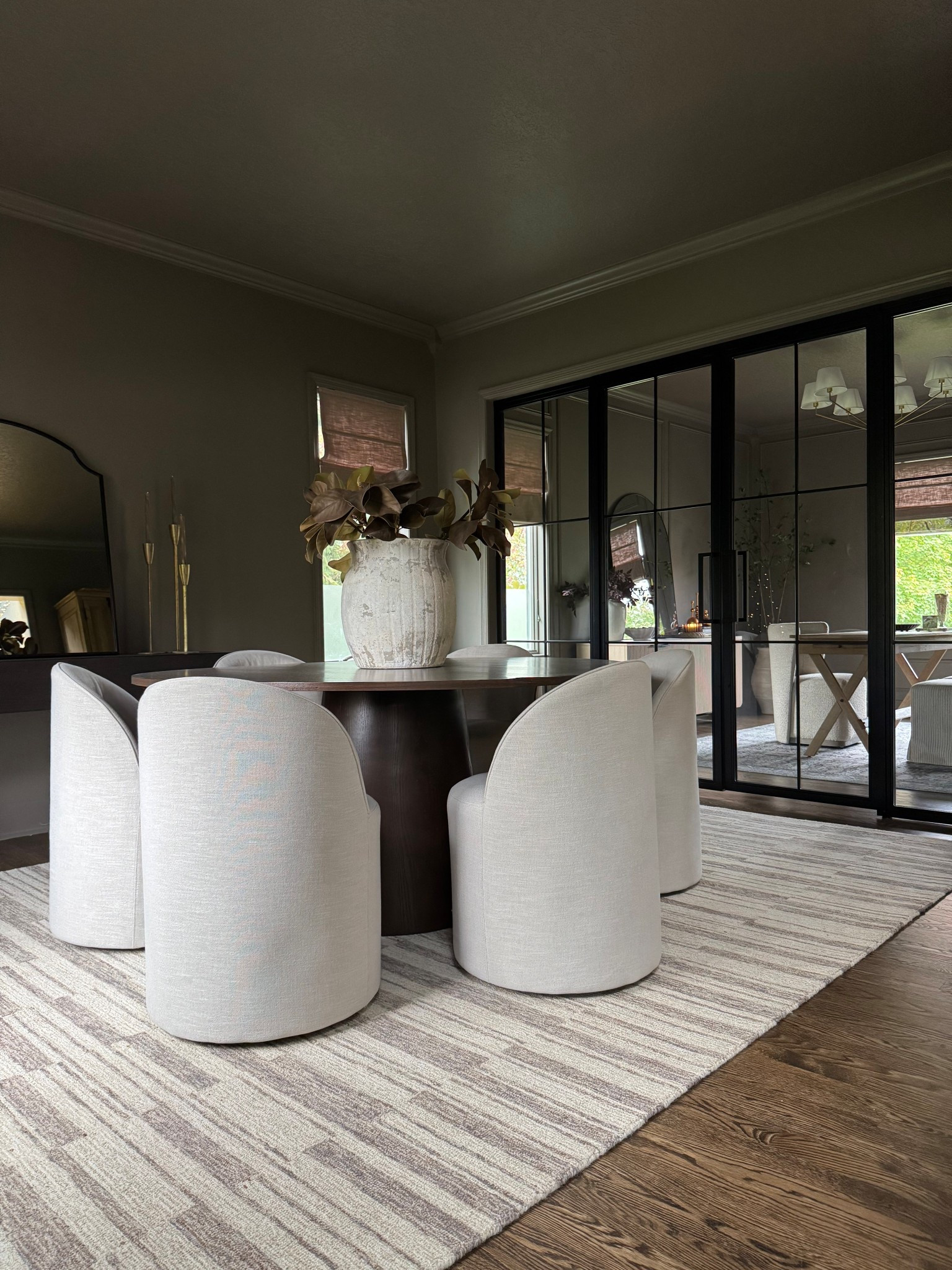 Shop our cozy dining room. This table and chairs are our favorite!
Featured are Doris Chairs and Orchid 52" table by @popmaison

Dining room, dining table, dining chairs, upholstered dining chairs, swivel chairs, swivel dining chairs, area rug, neutral rug, round table, wooden dining table, round dining table, console table, wooden console table, mirror, crate and barrel, pottery barn #mypotterybarn

#LTKHome #LTKSeasonal #LTKHoliday