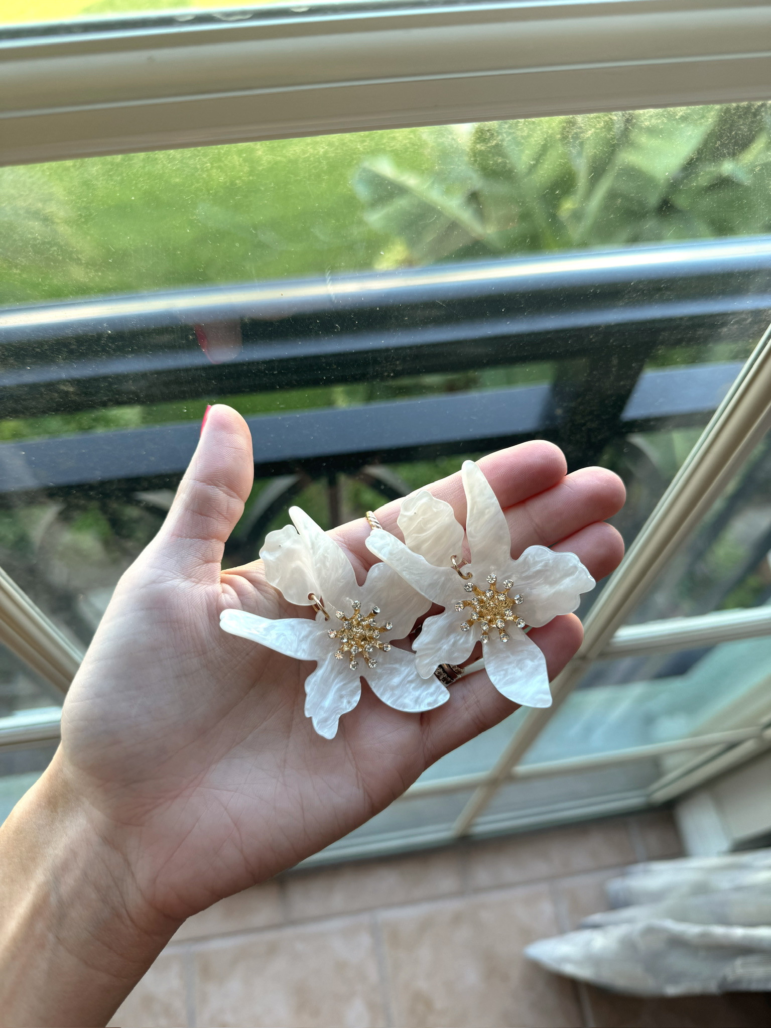 Found these stunning statement earrings that add a touch of elegance to any outfit.

statement earrings, boho jewelry, resin earrings, gold plated, resin flowers, elegant accessories, hallie ragan

#LTKgrwm #LTKootd #LTKmomlife