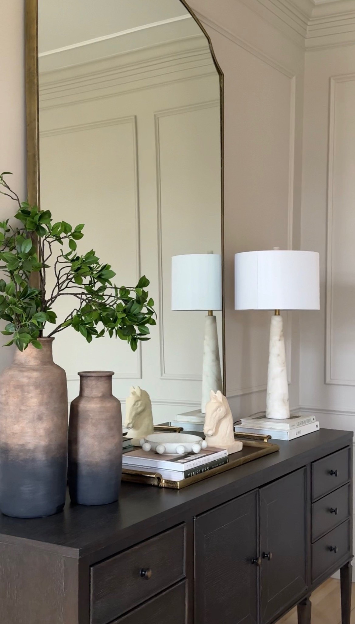 The most beautiful tabletop decor in our dining room! I love these vases and this mirror is always a showstopper. 👀

#LTKHome #LTKSeasonal