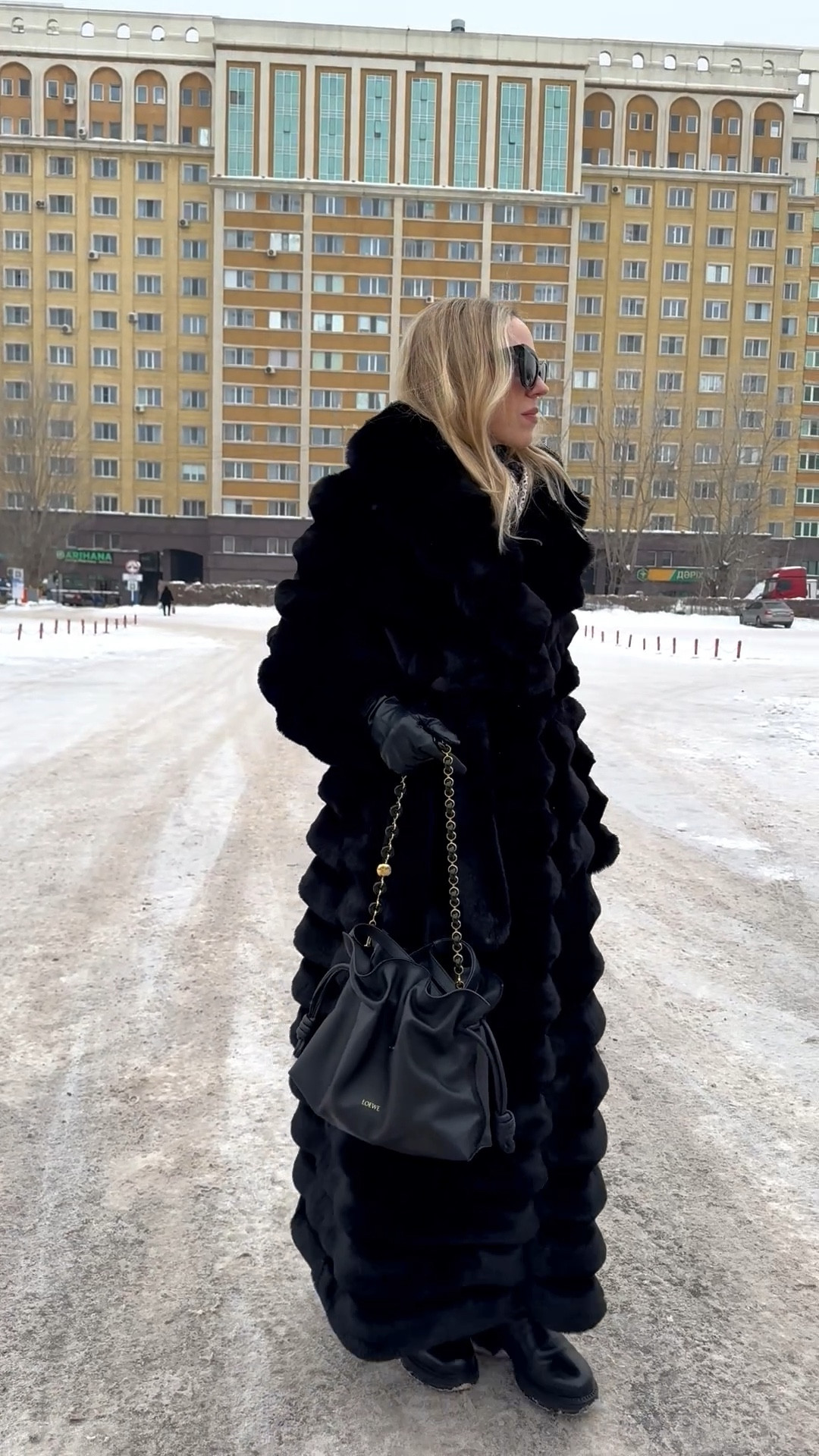 Faux chinchilla fur coat, Loewe Flamenco handbag, all black winter outfit 

#LTKSeasonal #LTKootd #LTKOver40