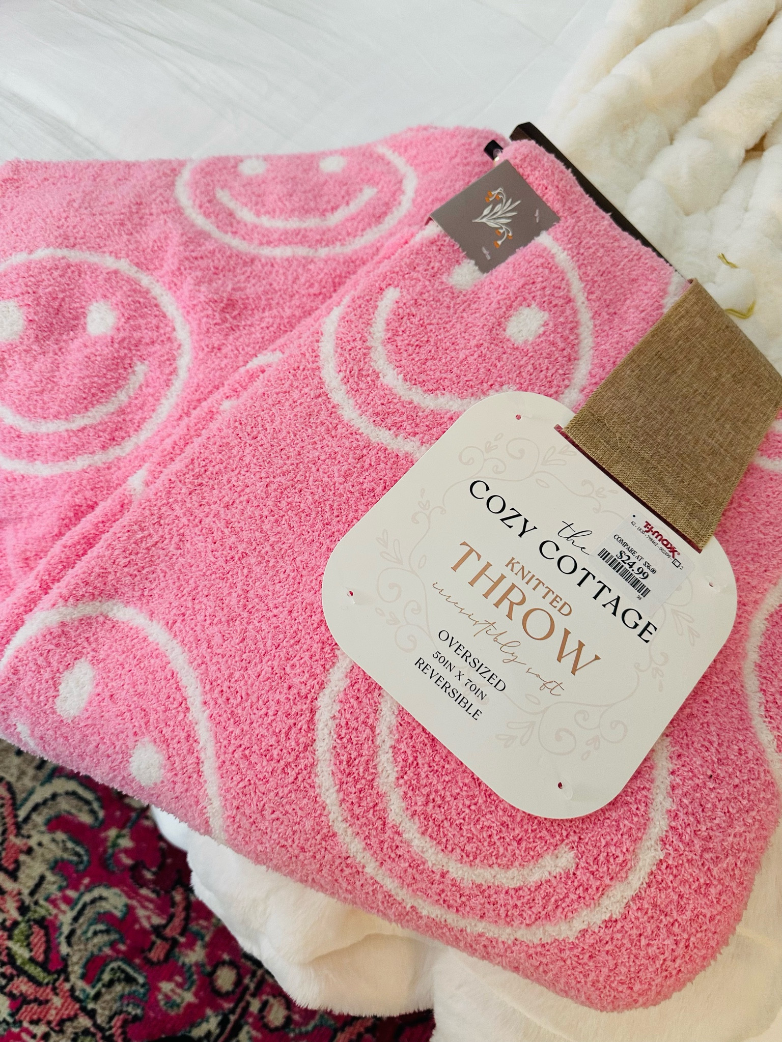 I found the CUTEST pink smiley face throw at TjMaxx today! 😍 I found the exact one on Poshmark so I linked it below. I also linked an identical one from Amazon! They have a light pink version along with other neutral colors. Perfect for your bedroom or living room! 💖 

Throws. Living room. Bedroom. Cute throws. Gift ideas for mom. Gift for mom. Gift for teenage girl. Decor. Tjmaxx. Amazon. 

#LTKfindsunder50 #LTKhome #LTKGiftGuide