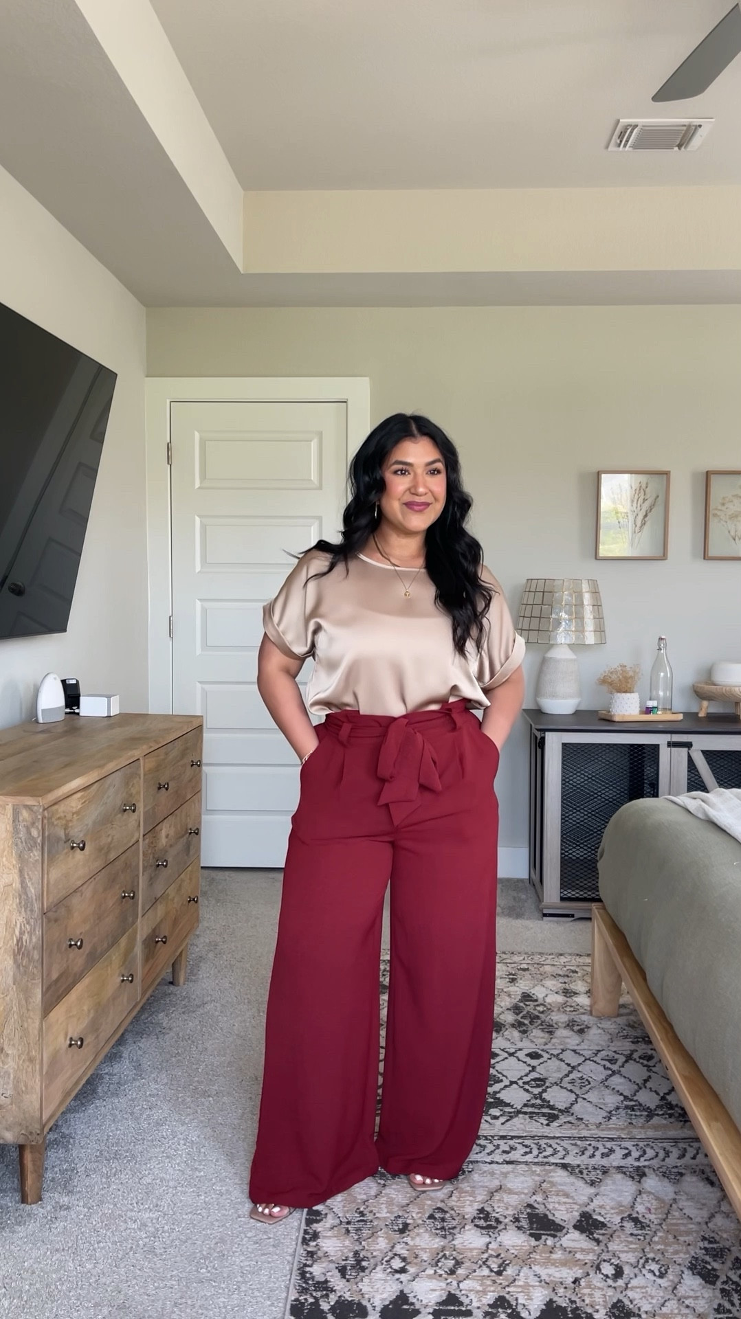 SIZING: I’m 5’1”, size 10-12 (more often a 12).⁣ // PANTS: wearing a size large in shade red, true to size. These are a little bit long on me so I have to wear a heel with them. I’m wearing a 3.5in heel in this reel. They are SO comfy! They’re a very lightweight flowy material.⁣ // BLOUSE: wearing a size large in shade Khaki, true to size. Such a lightweight, silky, satin material. The most perfect basic work top to have in your closet!⁣ // SHOES: true to size. Full transparency, these are not the comfiest heels ever lol. But they sure are cute 🤣⁣ // oversized black top I’m wearing is also Amazon, I’m in the large. Love this top with biker shorts. Bra is my favorite cami bra, i’d recommend sizing up one. 

#LTKPetite #LTKFindsUnder50 #LTKMidsize