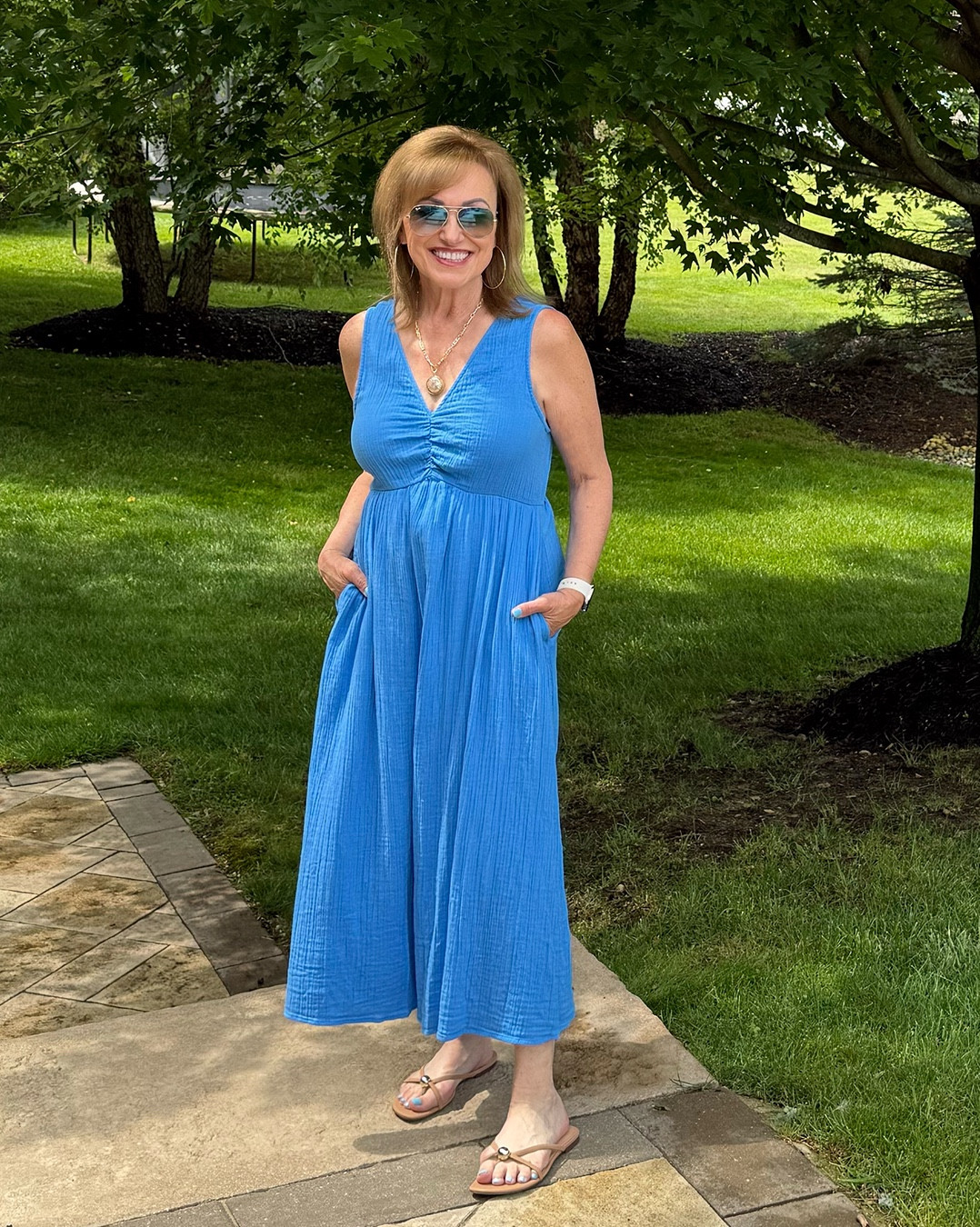 Sometimes, you just want a dress that lets you eat all the ice cream you want! This dress has a slightly looser fit, but it's still flattering! And the color is perfect!

I did purchase this dress from Macy’s to be comfortable.  In general, I prefer a form-fitting silhouette, but it’s nice to have options for those days when you just want a little extra room. What I like about his dress starts with the neckline.  The V-neck elongates the neck, which works well with the style of this dress. Since there is volume on the bottom, it’s nice to have a more fitted top.  The empire waist gives you a longer skirt bottom, which also lengthens your silhouette. I love this shade of blue (it comes in bright pink, white, and black also).


#LTKSeasonal #LTKOver40 #LTKStyleTip