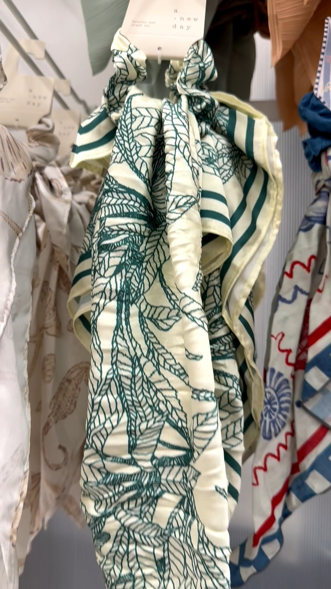 Be cute while staying cool with this sweet fabric hair tie with attached scarf combo. The silky fabric features a gorgeous tropical leaves design in sage and cream. 

#hairtie #hairaccessories #ponytailholder #summerofficeoutfit #summervacationoitfit #target #tropicalleaves #beachoutfit

#LTKPetite #LTKMidsize #LTKPlusSize