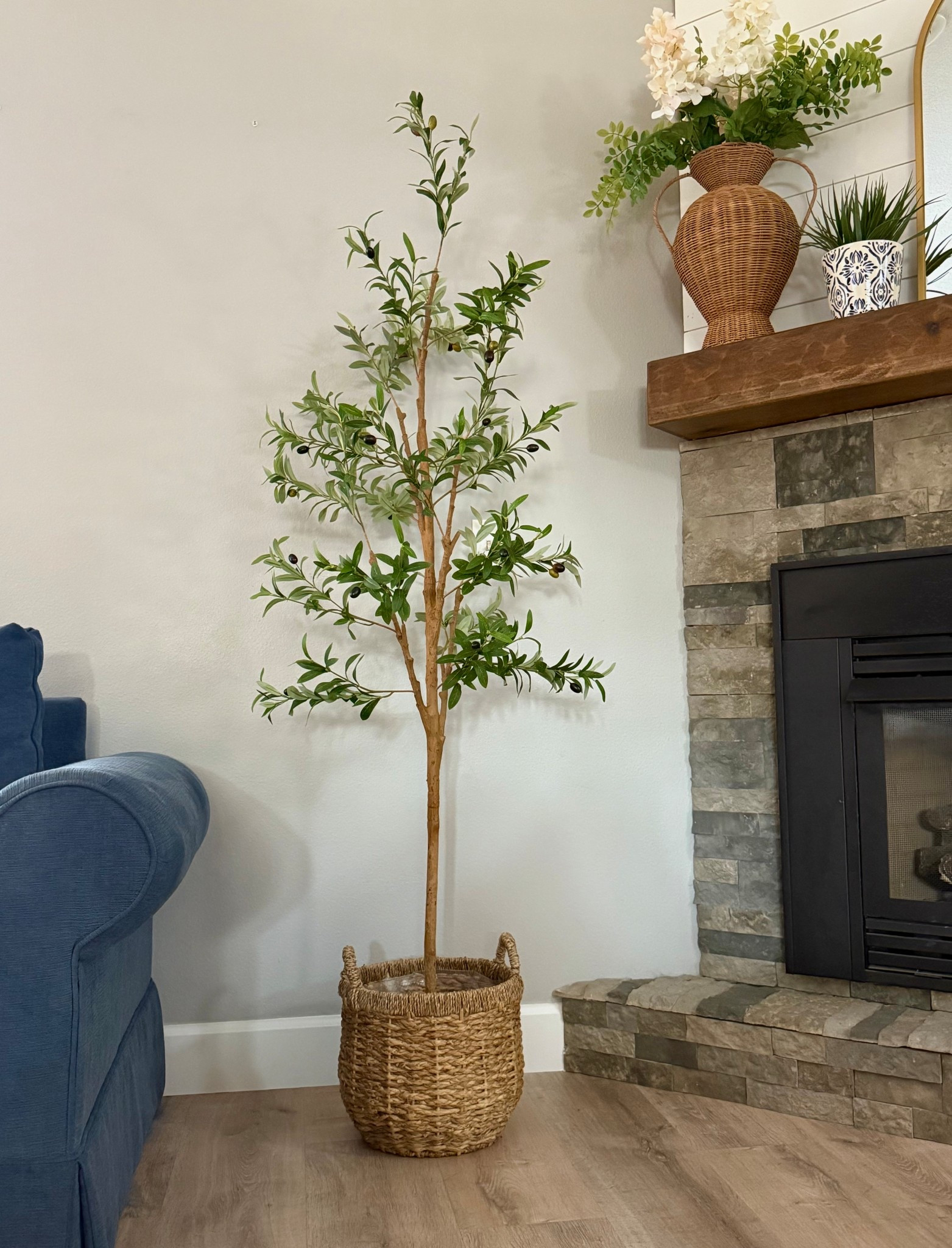 A few people have asked me to find a nice decorative tree to share. Well, if you know me, it had to be budget-friendly. I'm so impressed with the quality of this 6ft olive tree from Walmart! (Online only.) It came in 3 pieces, simple to put together, the base is weighted so it won't tip over. I put mine in a basket for now. It comes in 4 sizes, and all are under $40 and the shipping was fast shipping!

#LTKSeasonal #LTKHome