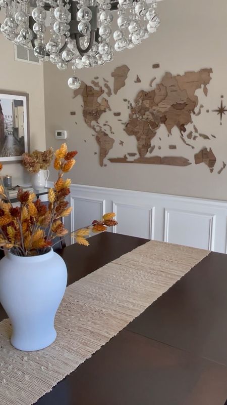 Dining room early Fall decor. Home decor ideas, neutral decor, woo den world map, simple home decor. #competition

#LTKhome #LTKSeasonal #LTKstyletip