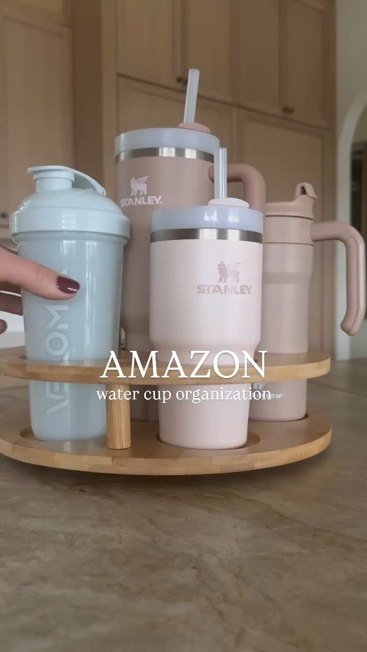 Loving this rotating wooden water cup organizer ! Perfect for pantry organization . 

#LTKHome #LTKWatchNow #LTKFindsUnder50