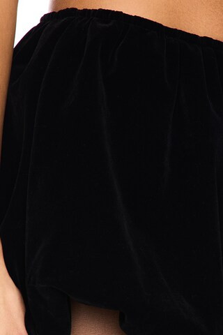 Allya Mini Skirt in Black | Revolve Clothing (Global)
