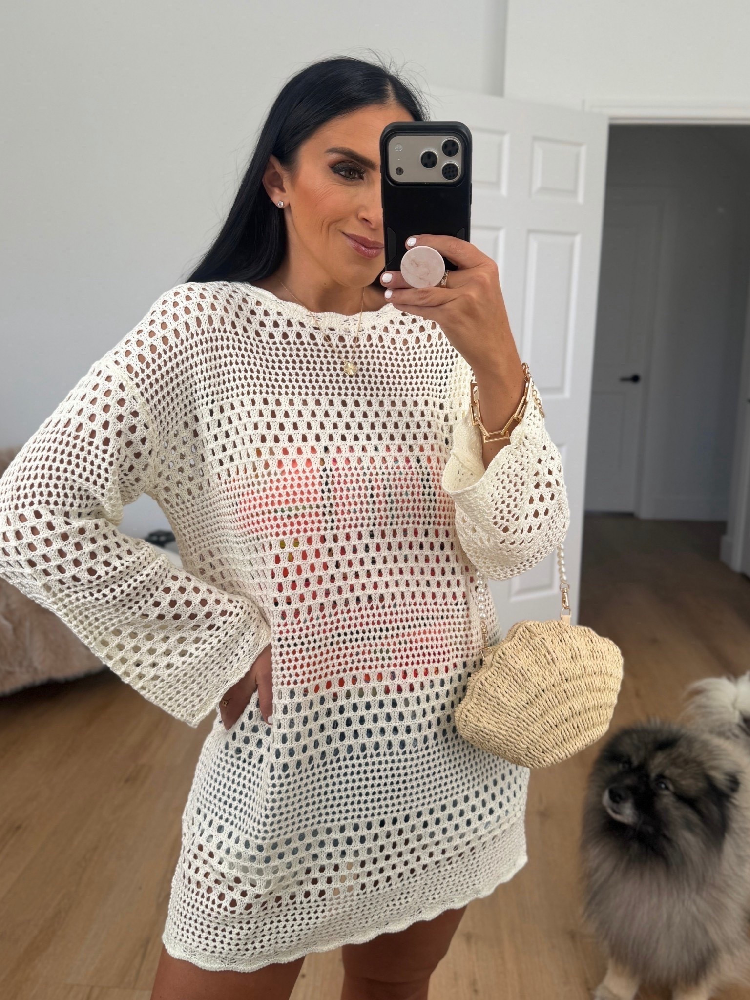 Women’s crochet swimsuit coverup wearing size medium. 
