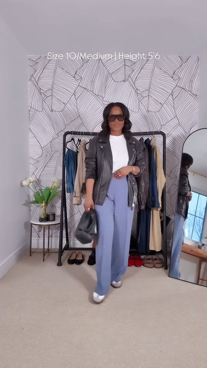 Spring Vibes & Street Style
For a mom on the go, creating a stylish yet practical outfit is key. This spring, simplicity and edge come together perfectly with a combination of timeless pieces like perfectly fitted trousers and a simple white t-shirt, paired with the go to Adidas Sambas for comfort and an oversized leather jacket for that edgy touch.

Comment “shop” for outfit details. 

spring fashion, mom style, casual chic, comfortable outfit, Adidas Sambas, oversized leather jacket, perfect trousers, white t-shirt, edgy look, effortless style, trendy outfits, spring trends, fashion for moms, stylish on the go, classic pieces, urban fashion, laid-back look, everyday outfit, spring vibes, fashion essentials, chic layers, practical fashion, modern mom wardrobe, versatile attire