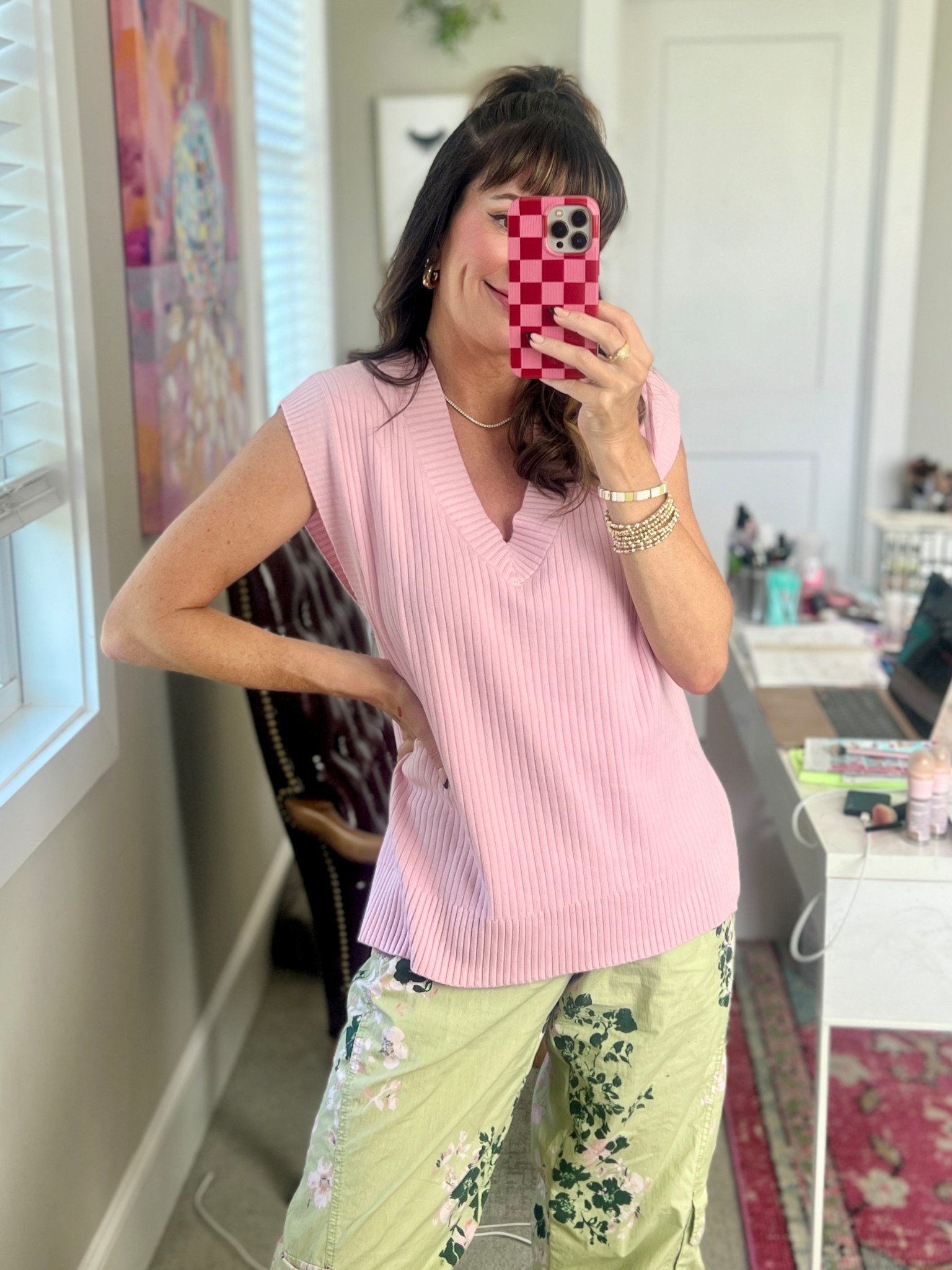 This oversized V neck sweater vest from Amazon is incredible! So soft, slight stretch, with cap like sleeves. I want ALL the COLORS. // wearing a small. // 🌺 add in a pair of floral printed pants and you’ve got yourself a fun outfit! 

#LTKFindsUnder50 #LTKStyleTip #LTKOver40