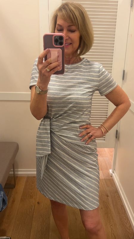 Flattering side tie waist detail on this striped spring dress! Marked down to $49! 

#LTKVideo #LTKSeasonal #LTKsalealert