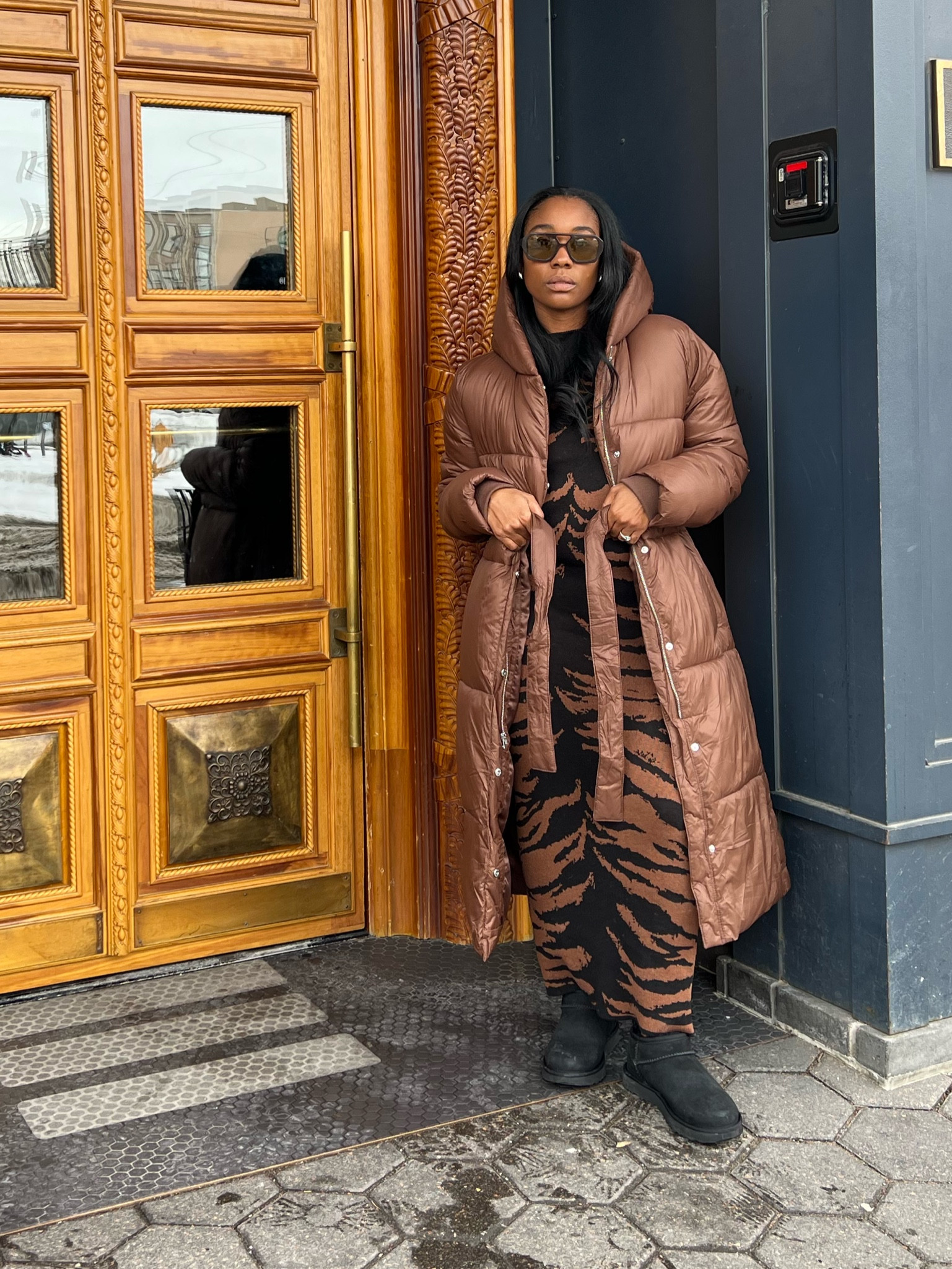 Brown puffer jacket and black mini ugg boots 

#LTKFind #LTKstyletip #LTKshoecrush