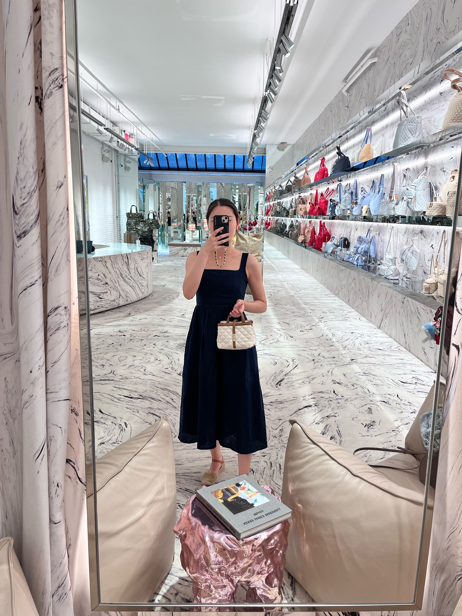 The perfect summer midi linen dress (wearing XS) here and a mini handbag try-on from MZ Wallace. This mini handbag comes with a removable crossbody strap or can be worn as a top handle. This bag comes with two sided zippered compartments and fits a lot for how small it looks.

#LTKStyleTip #LTKItBag #LTKWorkwear