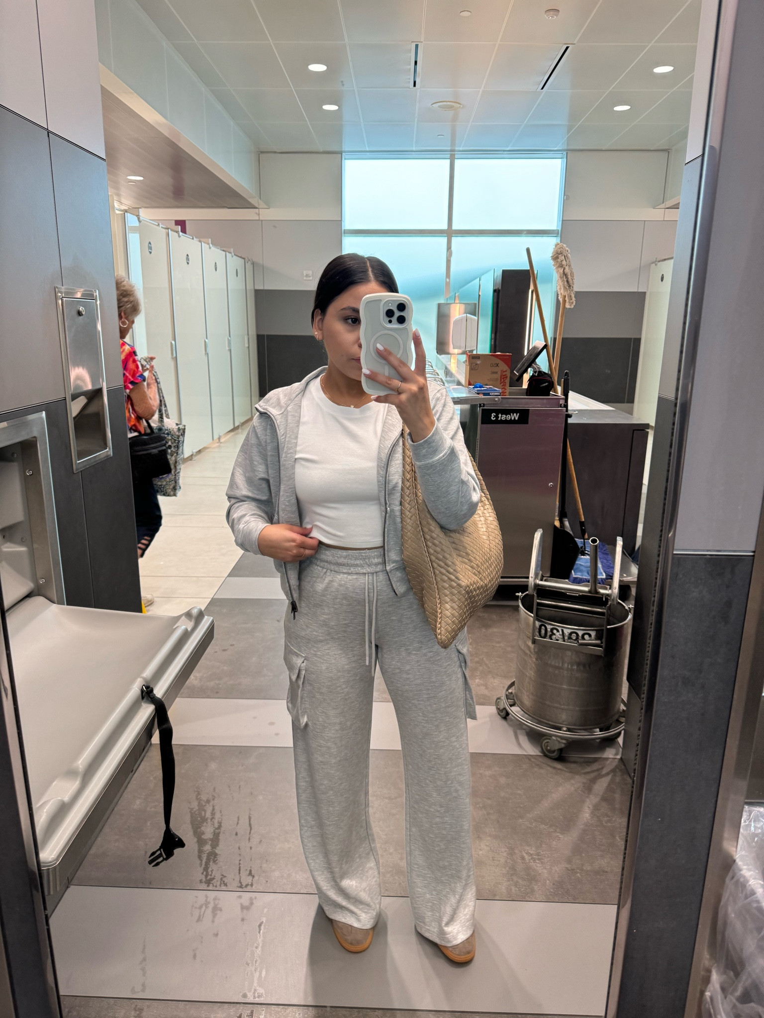 Travel outfit idea 
White tee: small 
Grey cargo sweatpants: xs 
Grey zip sweater: xs 
Woven tote bag 
Adidas handball spezial sneakers: 4.5 men

#LTKFindsUnder50 #LTKTravel #LTKCon