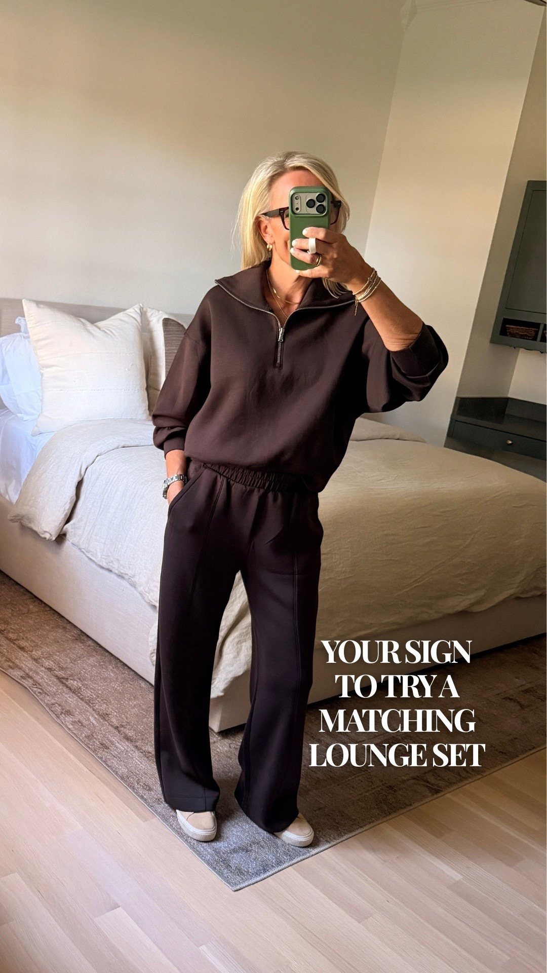 A matching lounge set that makes comfortable days feel a little more put together. I love the rich chocolate-brown color, relaxed quarter-zip top, and wide-leg pants. Paired with simple sneakers, it’s an easy outfit for travel days, casual errands, or a relaxed day at home.