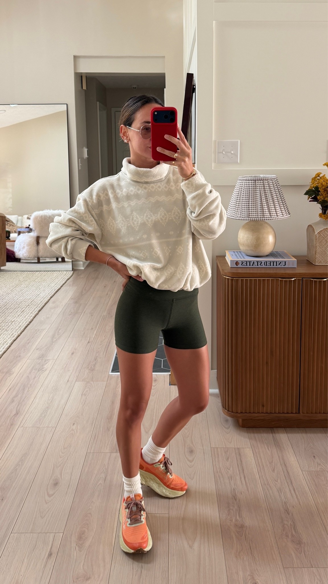 Small sweatshirt! Biker shorts are old Beyond Yoga color and sneakers are super old NB fresh foam more trail but I found a cool current version!