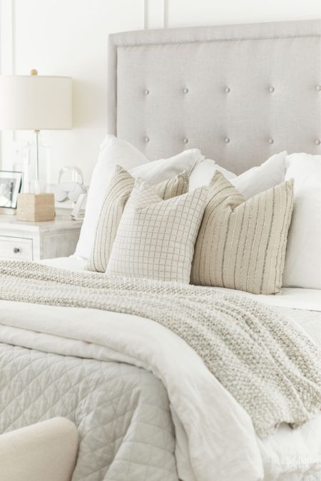 I just made a few changes to my bedding by switching out to these striped and checked throw pillows, changing to a light gray quilt and adding this affordable chunky knit blanket. I’m still using the white linen duvet and pillow shams I’ve used for years! home decor bedroom decor neutral bedroom white bedding platform bed

#LTKHome #LTKStyleTip