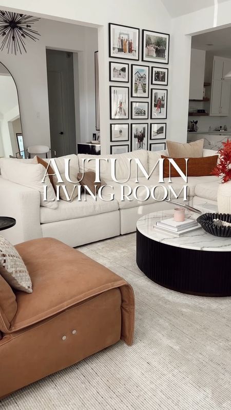 Autumn living room with matte vase and stems, textured pillows, marble side table, oversized vase, cashmere throw and more! Love this look for autumn and year-round 

#LTKhome #LTKstyletip