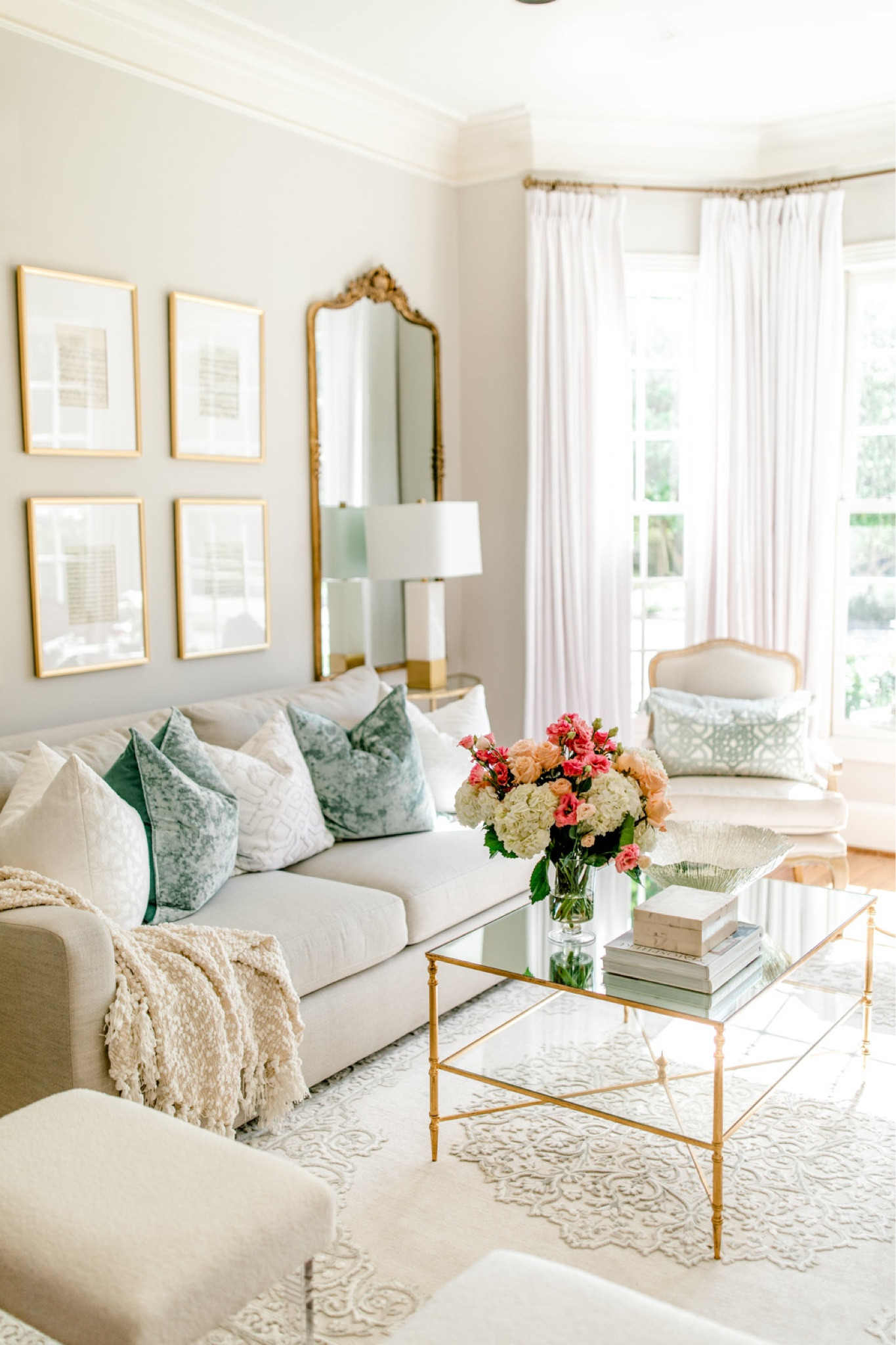 Formal living room large antique over here is gold frame 16 x 20 frame sheet music antique sheet music gold mirror top coffee table beautiful affordable rug from Chairs French Accent The Chairs

#LTKstyletip #LTKhome #LTKsalealert