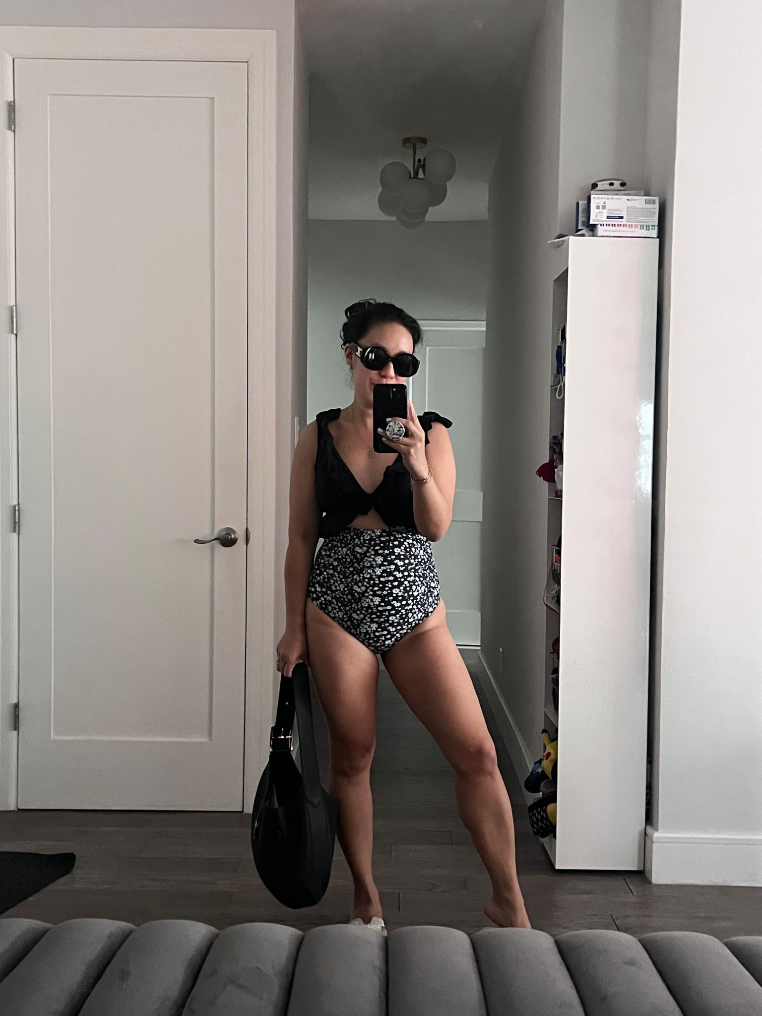 One piece swim. Black and white outfit. I’m wearing an xs. Adjustable straps. Tie back. Ruched center. Great fit! So many colorways. 

#LTKmomlife #LTKTravel #LTKSwim