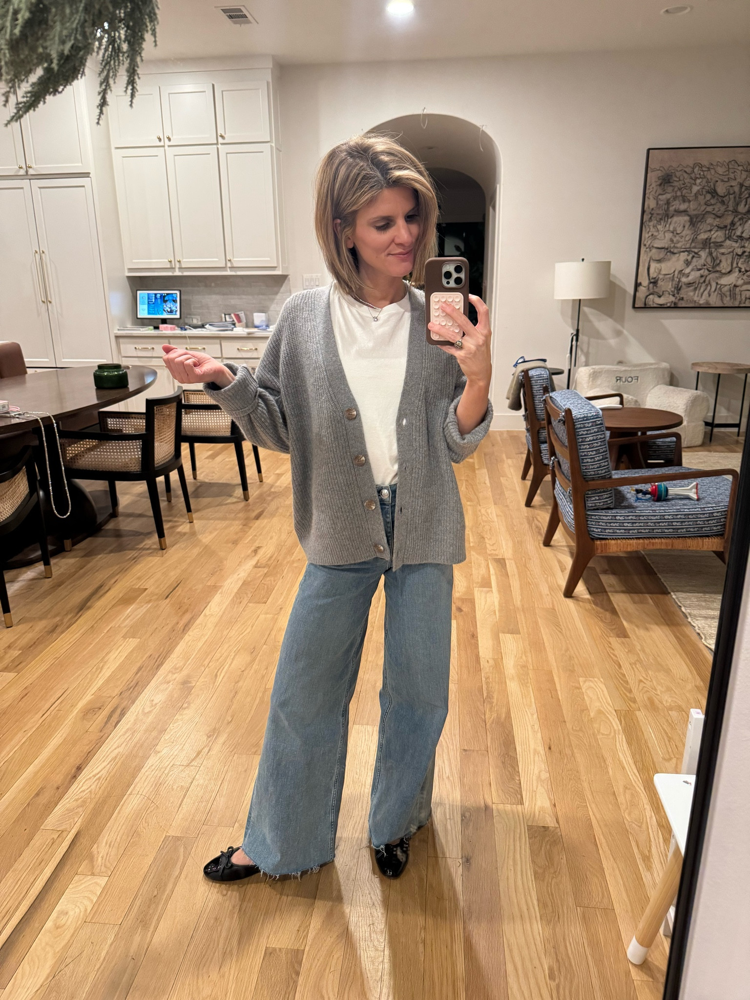 Wearing XS in tee and sweater 