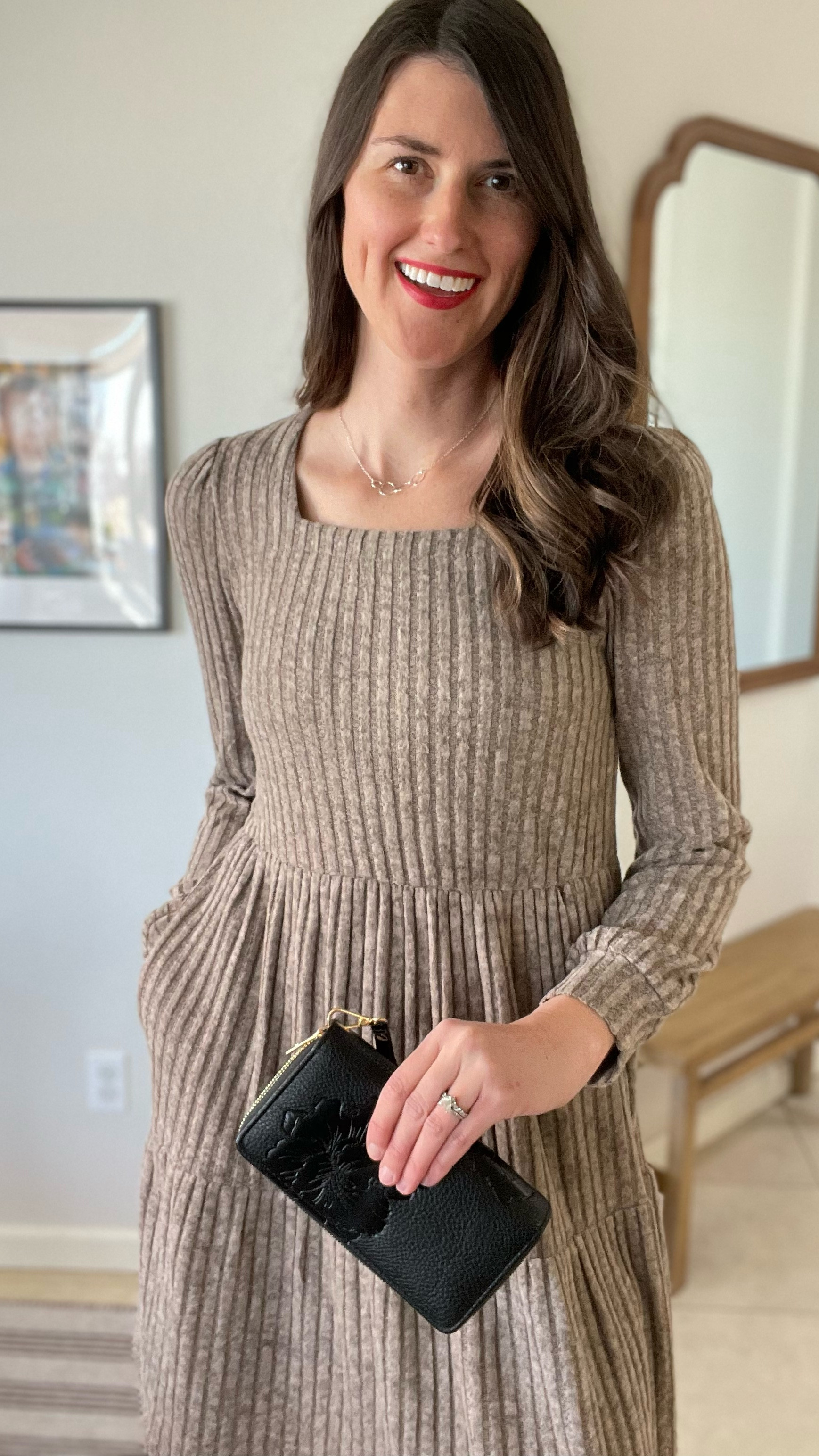 Over 40 look. This gorgeous sterling silver for ring necklace is for four decades. I love this ribbon long sleeve dress that has pockets in a neutral color wearing a size medium. And this gorgeous black clutch with flowers on the outside is antitheft to prevent people from stealing your credit card information.

#LTKOver40 #LTKFindsUnder50 #LTKStyleTip