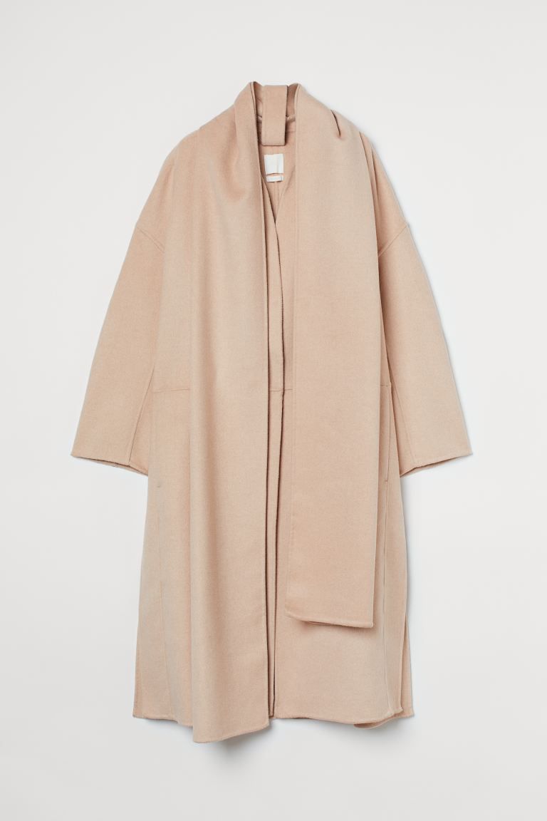 Relaxed-fit, calf-length coat in a soft, woven wool blend with a wide, detachable scarf that fast... | H&M (US)