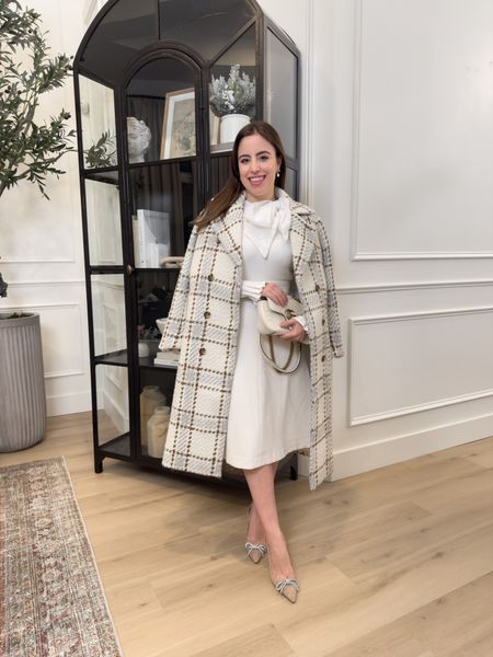All white Holiday party outfit idea! Love this bow sweater, midi skirt and plaid wool coat. Also love these bow pumps and my Gucci bag



#LTKHoliday #LTKstyletip #LTKSeasonal