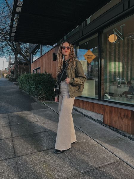 Daily Look 3.9

Sézane tee, I sized up, S. Old Gap bomber jacket; similar linked. Zara Marine Straight Jeans, take your larger size. Madewell Flats, 6.5, TTS. Sézane bag. Quince sunglasses  

#LTKover40 #LTKSeasonal