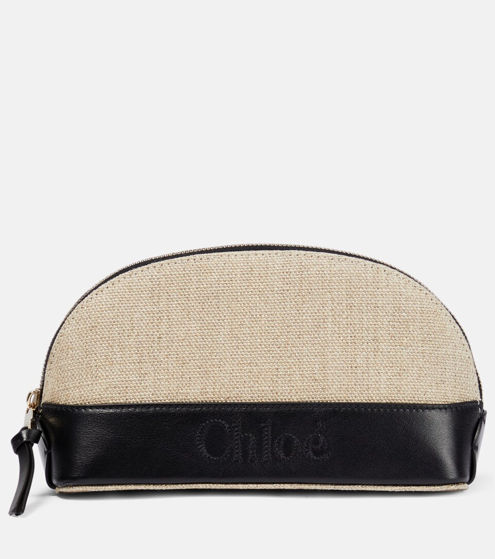 Sense Small linen and leather clutch | Mytheresa (US/CA)